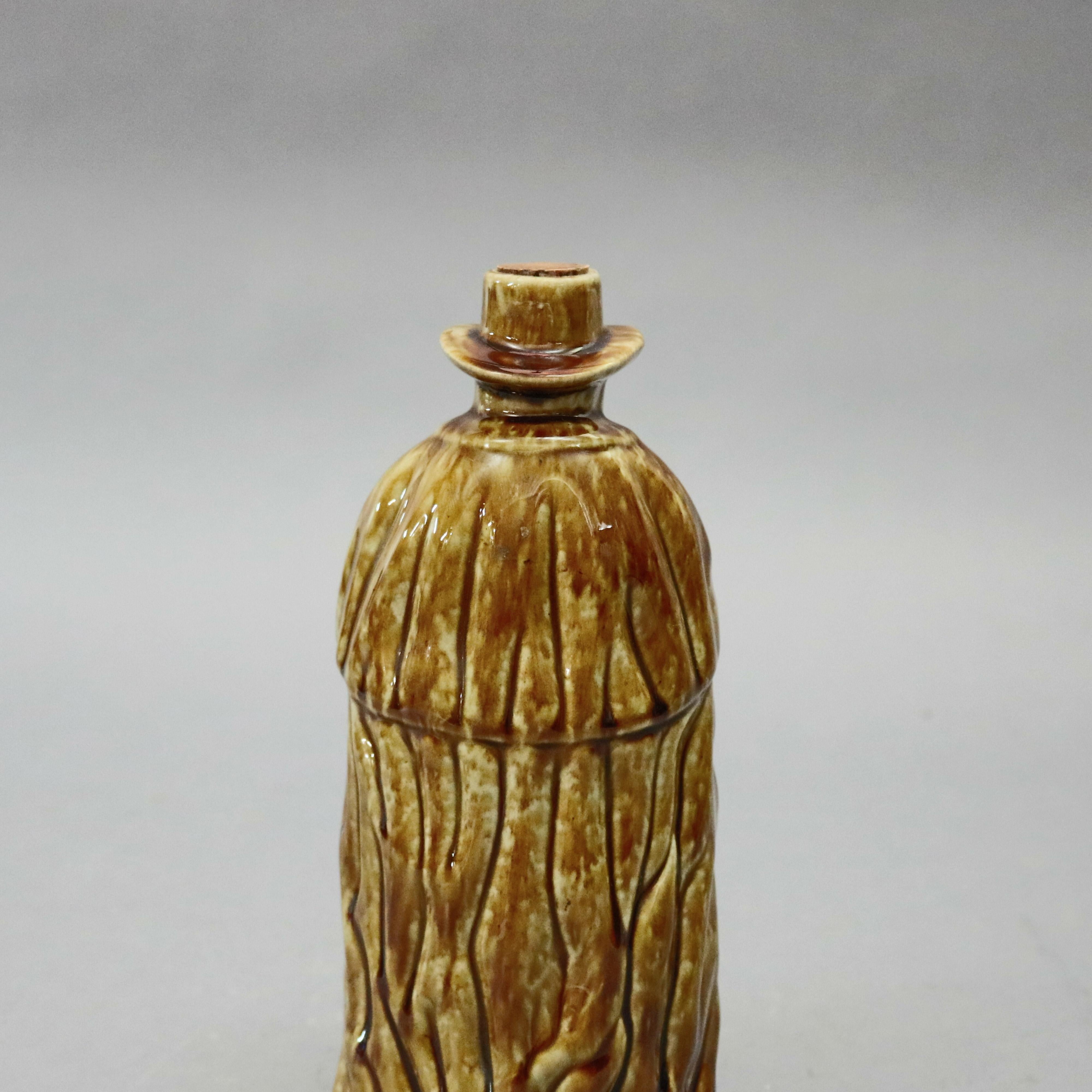 Primitive Antique Bennington Pottery Figural Coachman Flask in Rockingham Glaze circa 1849