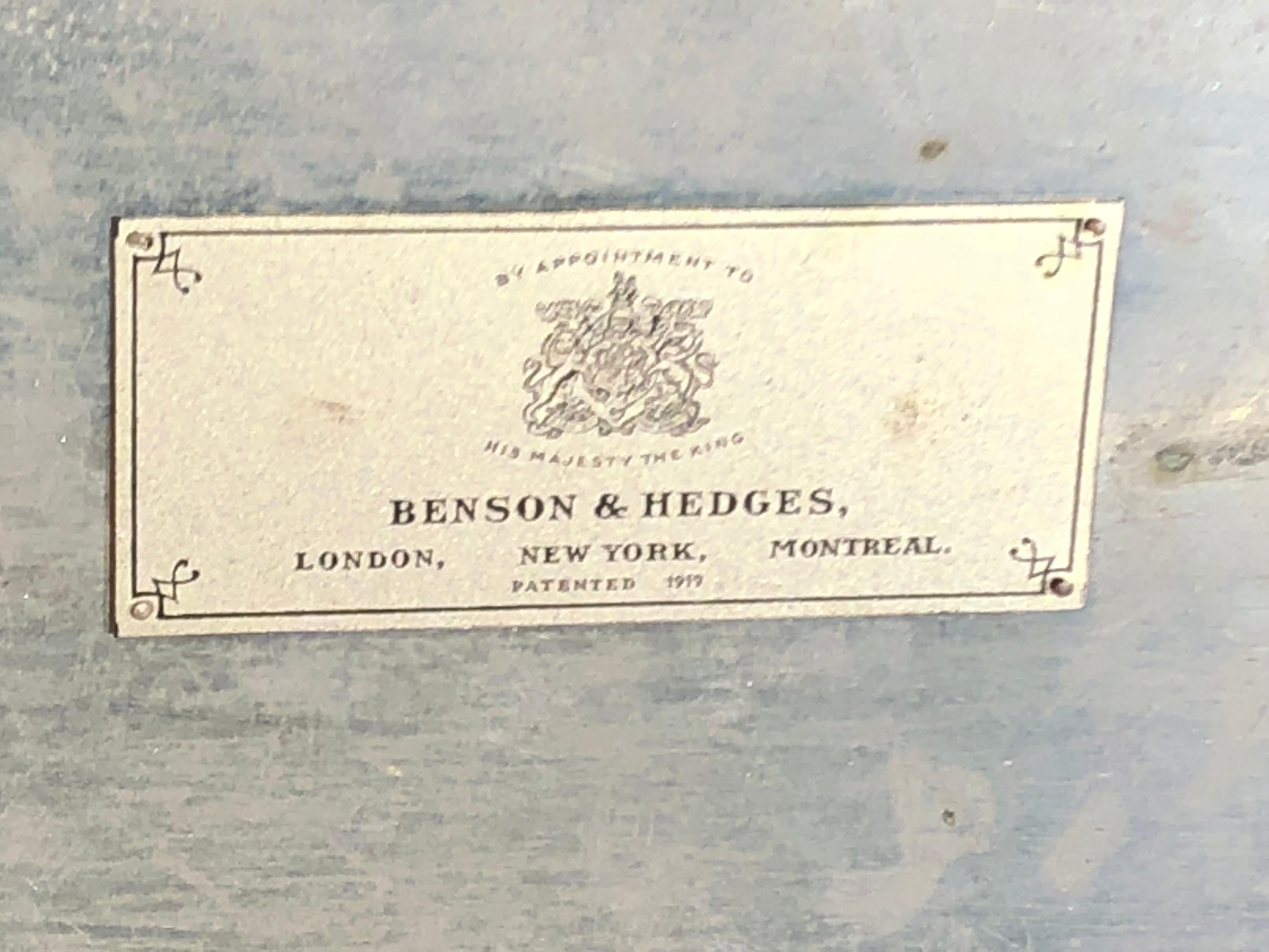 An early 20th century mahogany humidor by Benson & Hedges London, with brass mounts, the interior lined with cork and having a tin and copper liner. 
  