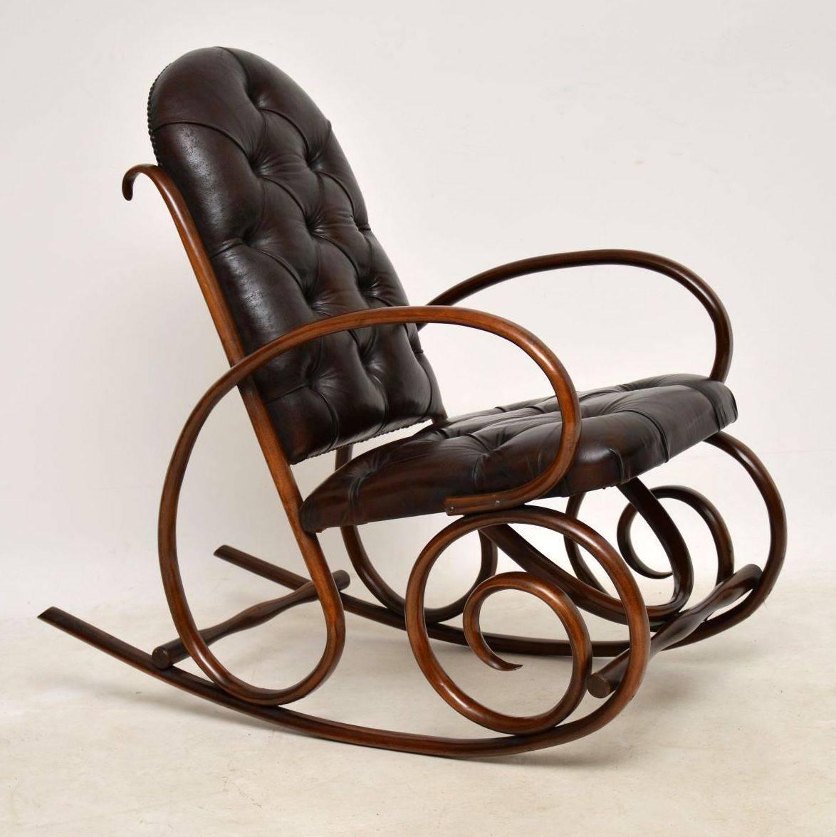 Original antique Victorian Thonet bentwood rocking chair upholstered in brown leather and in good condition. The back and seat are deep buttoned and the leather is in excellent original condition. We have just had it revived and polished. Originally