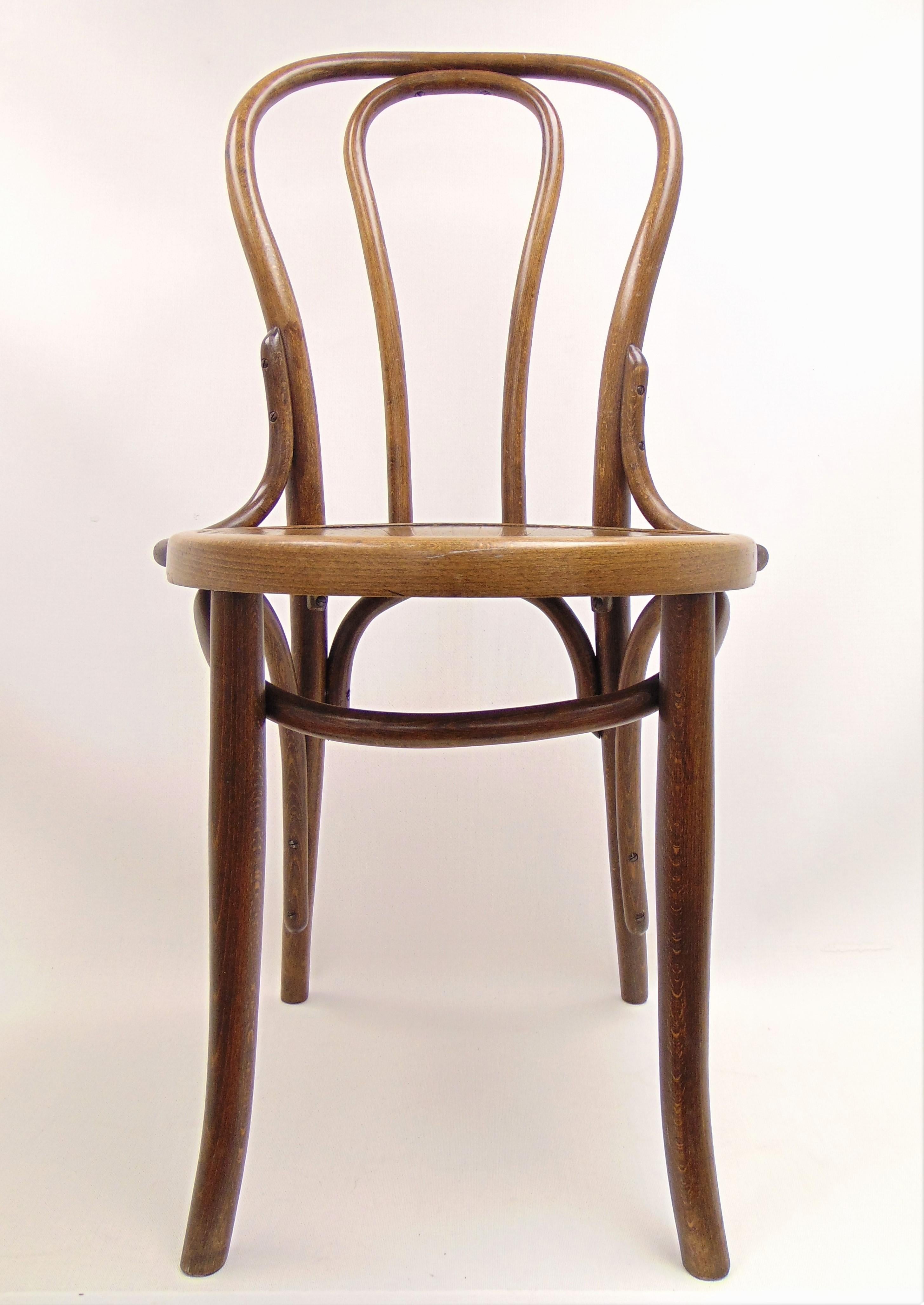 This is a stunning sculptural antique bentwood chair by Jacob & Josef Kohn from the early 1900s. The chair is in wonderful original condition. Made in Czechoslovakia.
The measurements are:
22'' depth
18'' width
35'' total height
18 1/2'' seat