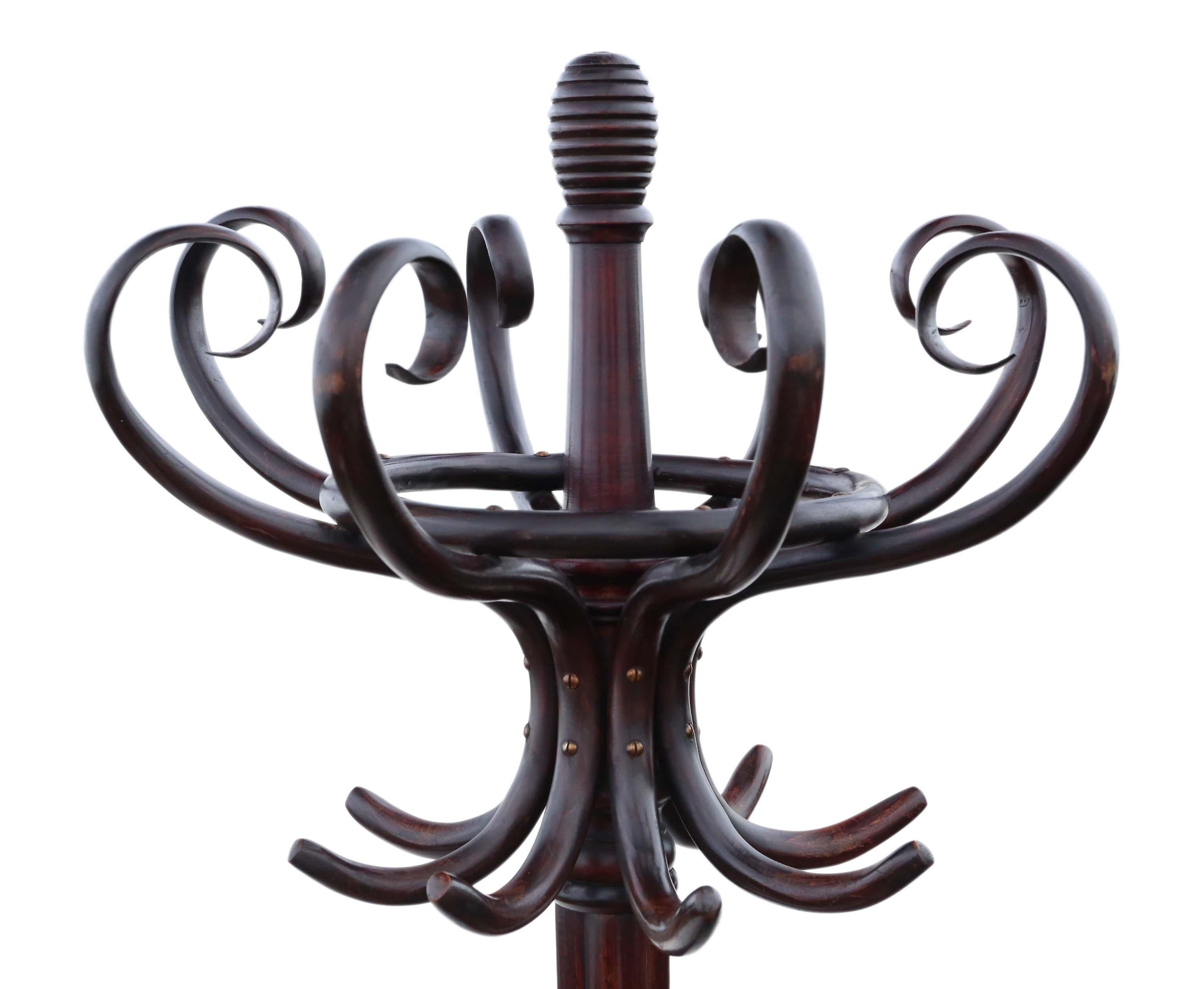 Antique fine quality Victorian bentwood hall, coat, hat, stick, umbrella, stand. 8 rotating combined coat and hat hooks.

Dates from circa 1900. Lovely age and charm. Far better than most.

Solid, heavy and strong with no loose joints and no