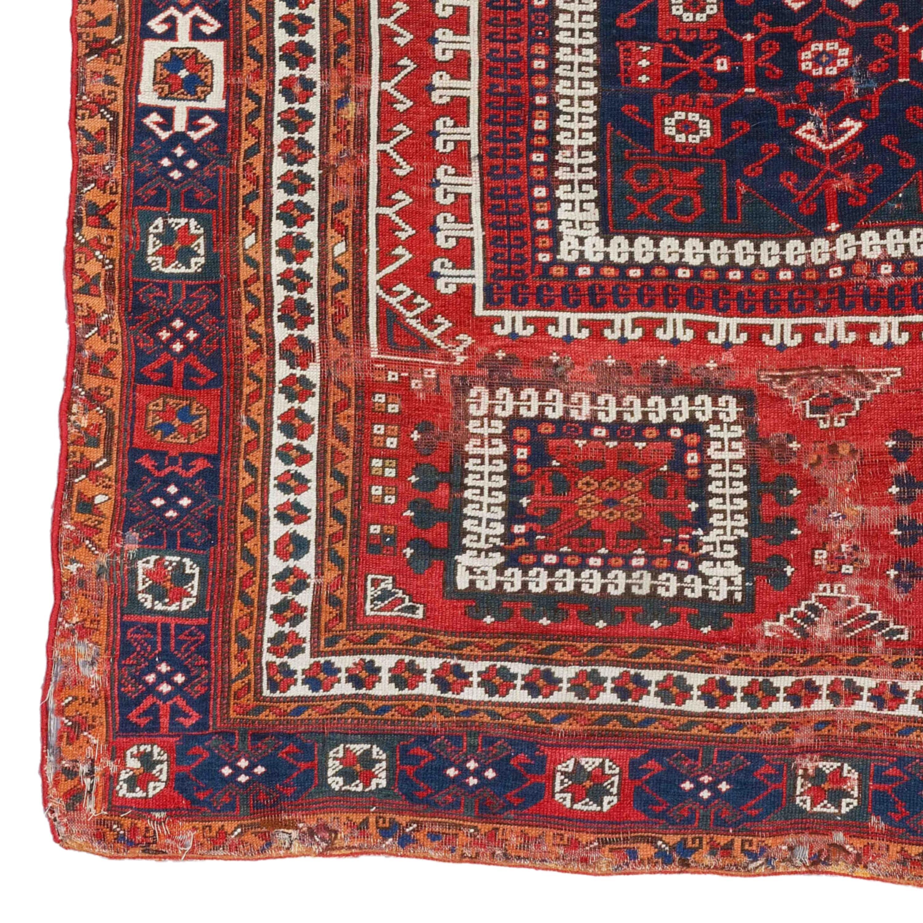 Antique Bergama Rug - Early 19th Century Anatolian Bergama Rug Size 146 x 161 cm (4,79 x 5,28 ft)
Red, blue, and white, are highly varied. Several designs, showing rows of panels or central medallion designs, preserve the fashions of much earlier