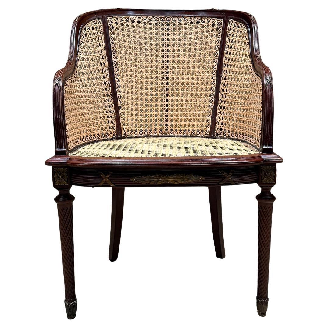 For your consideration, an Antique Bergère Doouble Caned Victorian French armchair
French double cane 19th century.
Mahogany & bronze accents with original patina. New cane, wood finish has been restored.
Preowned vintage restored
Dimensions: 34 h x