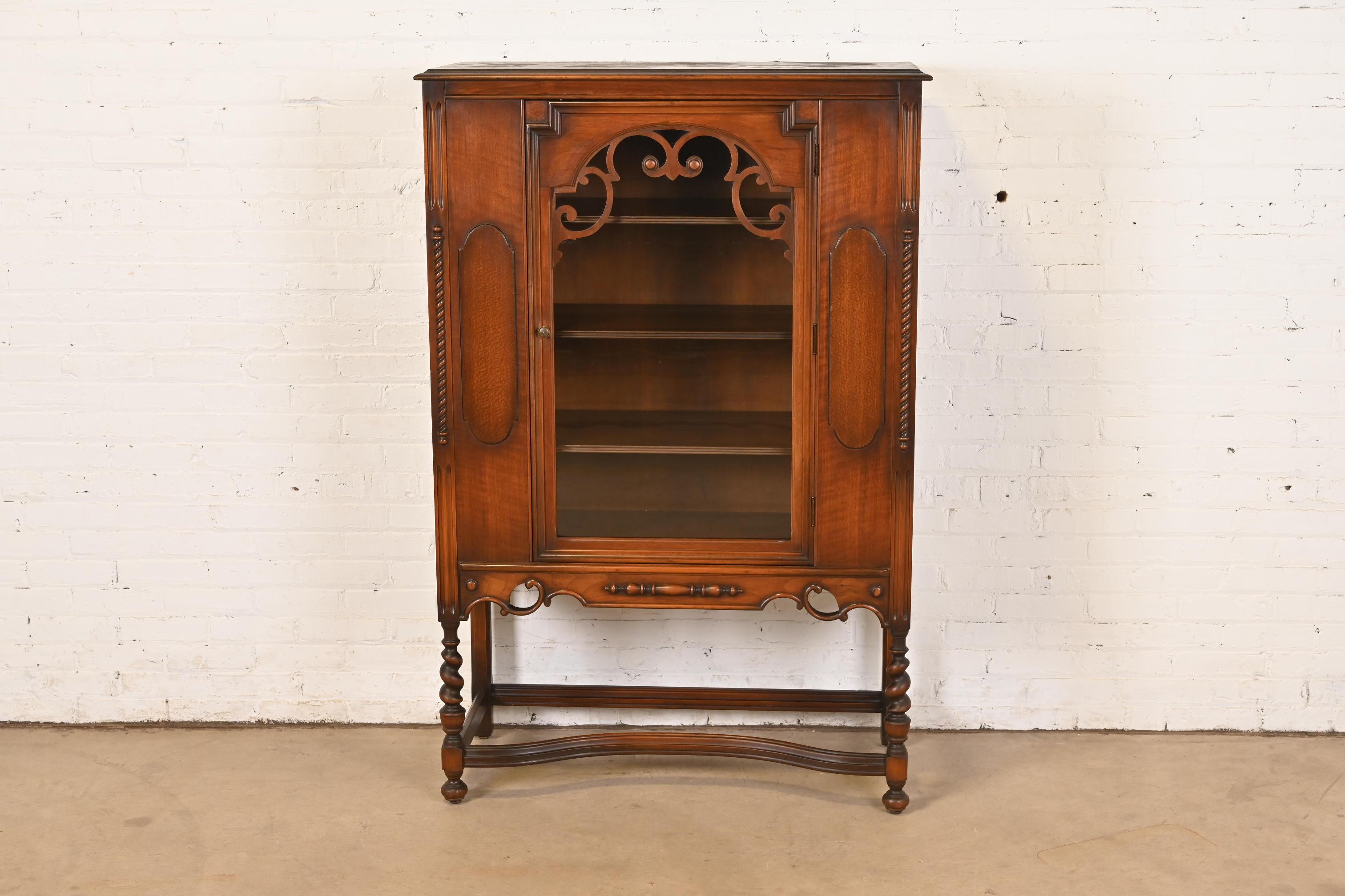 American Antique Berkey & Gay Style English Jacobean Carved Walnut and Burl Wood Bookcase For Sale