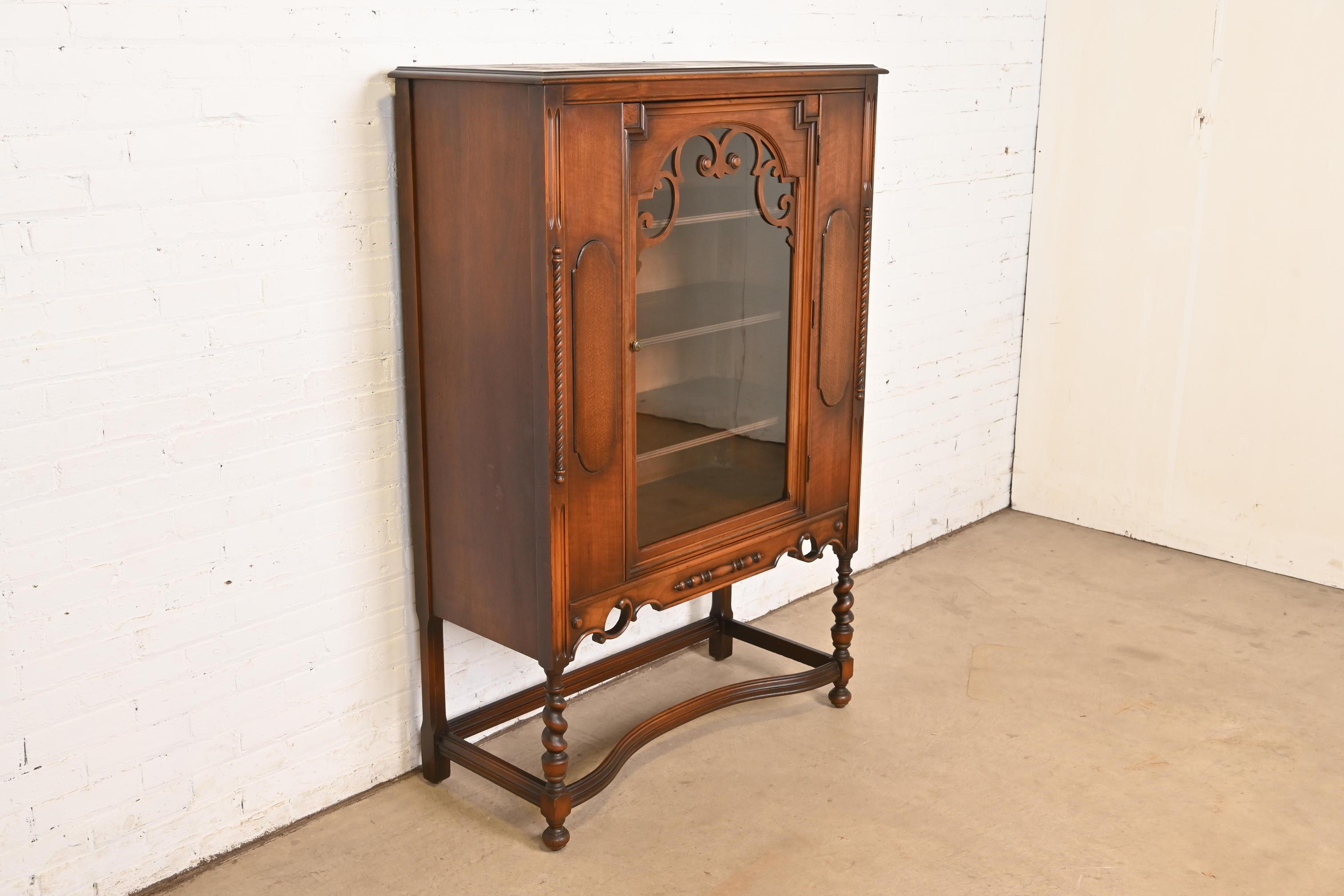 Early 20th Century Antique Berkey & Gay Style English Jacobean Carved Walnut and Burl Wood Bookcase For Sale