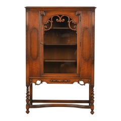 Antique Berkey & Gay Style English Jacobean Carved Walnut and Burl Wood Bookcase