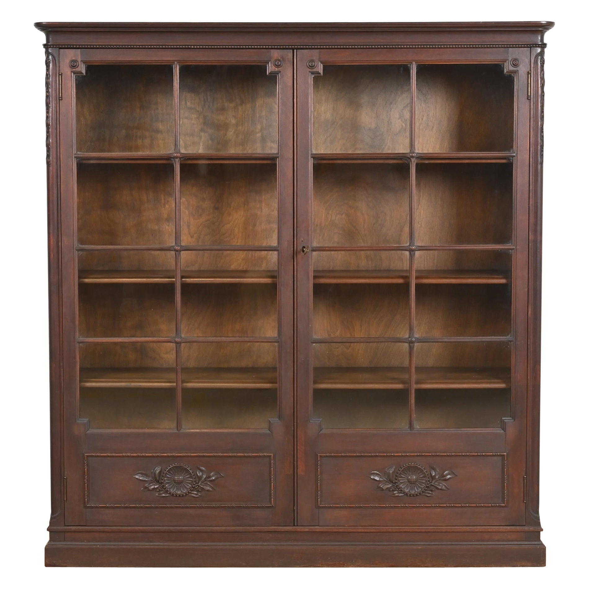 Antique Berkey 
Gay Victorian Carved Walnut Bookcase, Circa 1900