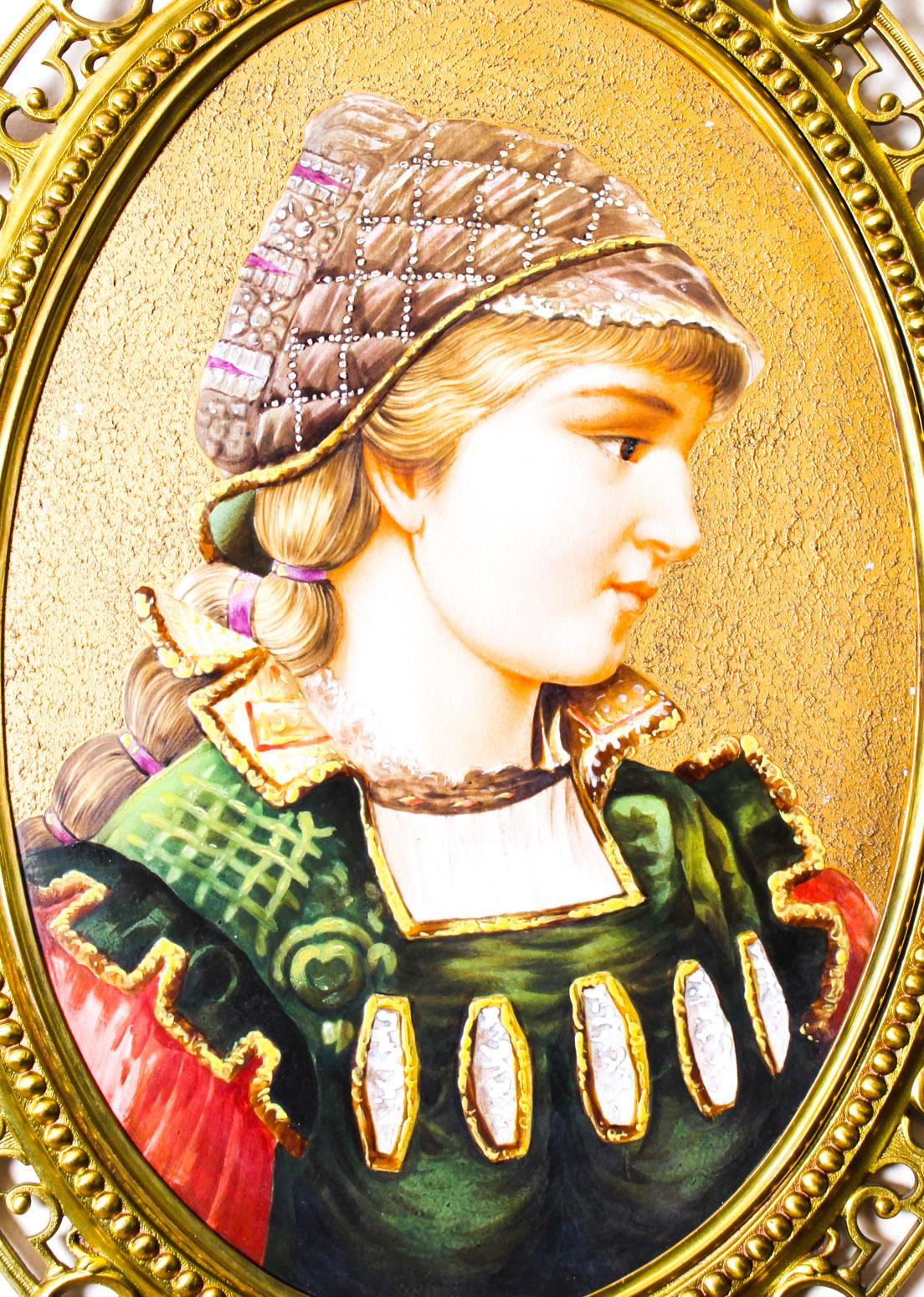 This is a stunning and unique antique Berlin framed porcelain plaque, circa 1870 in date.

This magnificent plaque is oval in shape with an exquisite gilded cast and pierced ormolu frame which borders a spectacular central hand painted portrait of