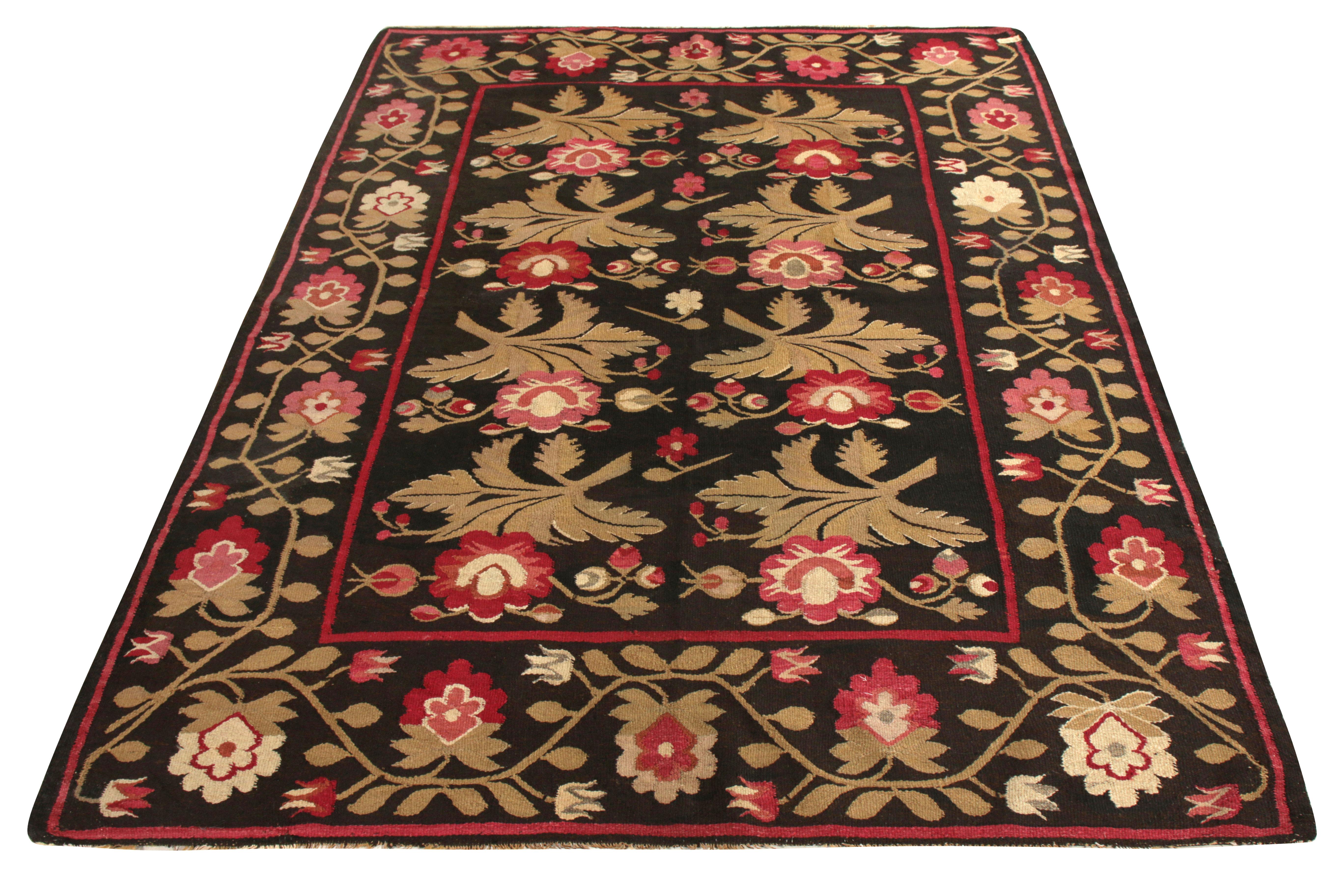 A 5x7 Bessarabian Kilim rug relishing classic floral intricacy in fine wool foundation entering Rug & Kilim’s exclusive line of classic Kilims. The floral design lends a welcoming vibe with vibrant red and pink hues, highlighted naturally against a