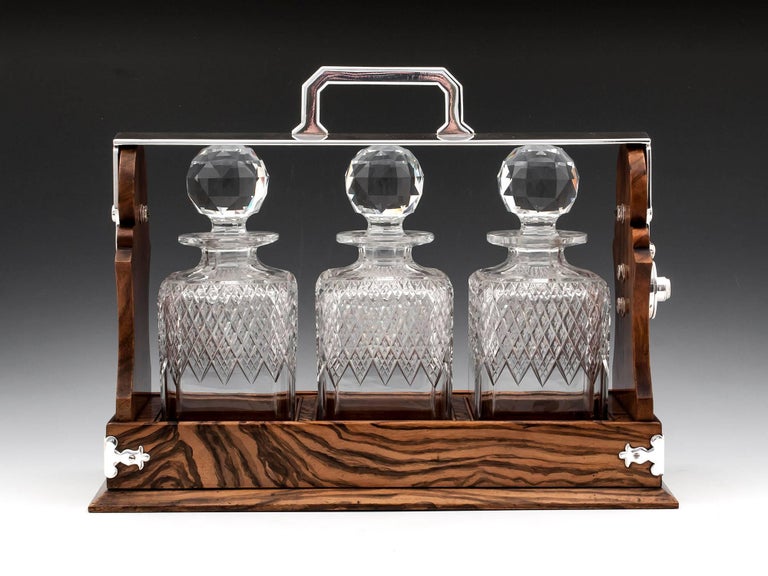 Antique Betjemann Feathered Walnut Tantalus Lead Crystal Decanters
