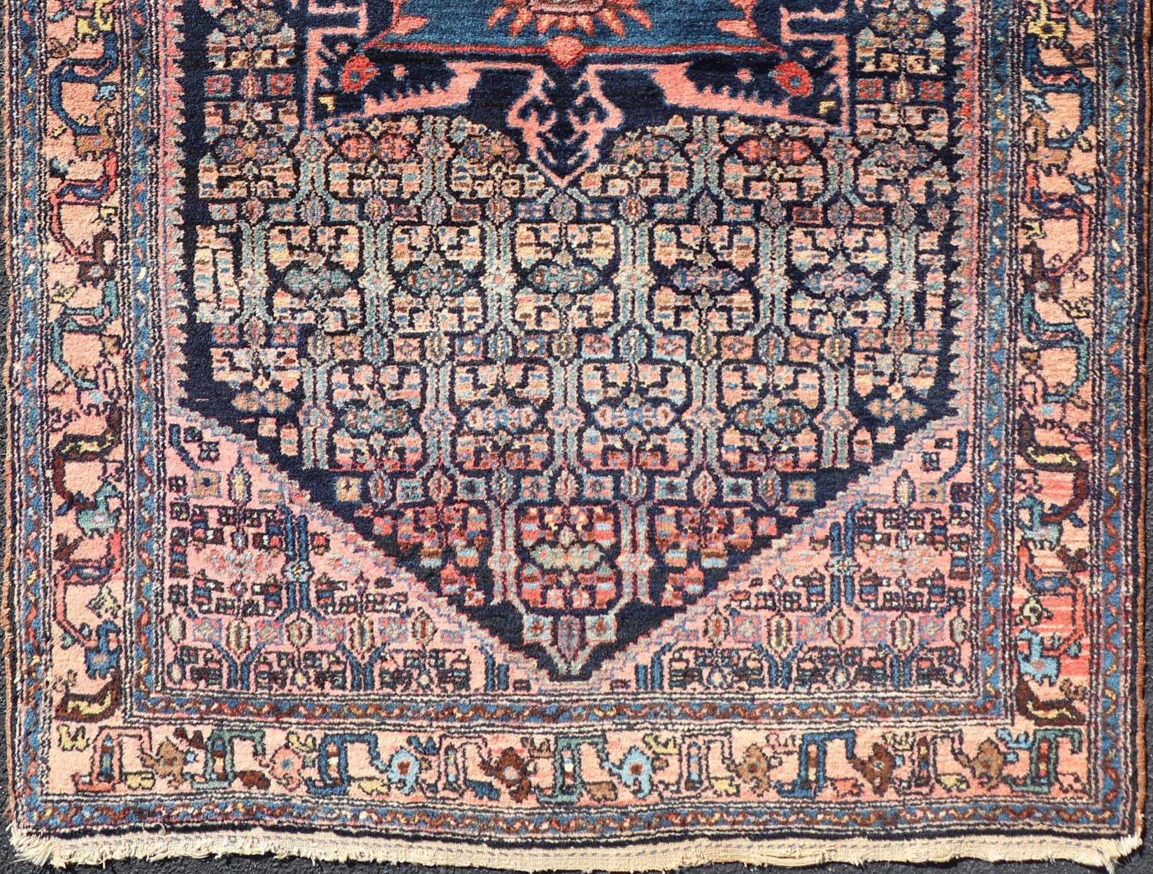 Persian Antique Bibiakabad Rug with Layered Medallion and Geometric Design in Background For Sale