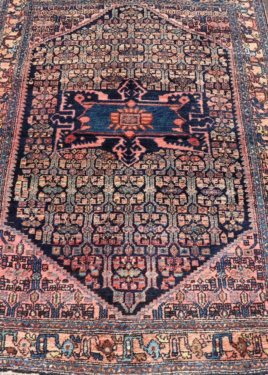 Antique Bibiakabad Rug with Layered Medallion and Geometric Design in Background In Good Condition For Sale In Atlanta, GA