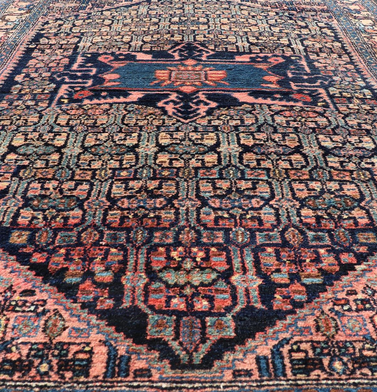 20th Century Antique Bibiakabad Rug with Layered Medallion and Geometric Design in Background For Sale