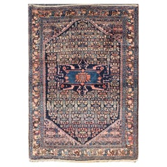 Antique Bibiakabad Rug with Layered Medallion and Geometric Design in Background