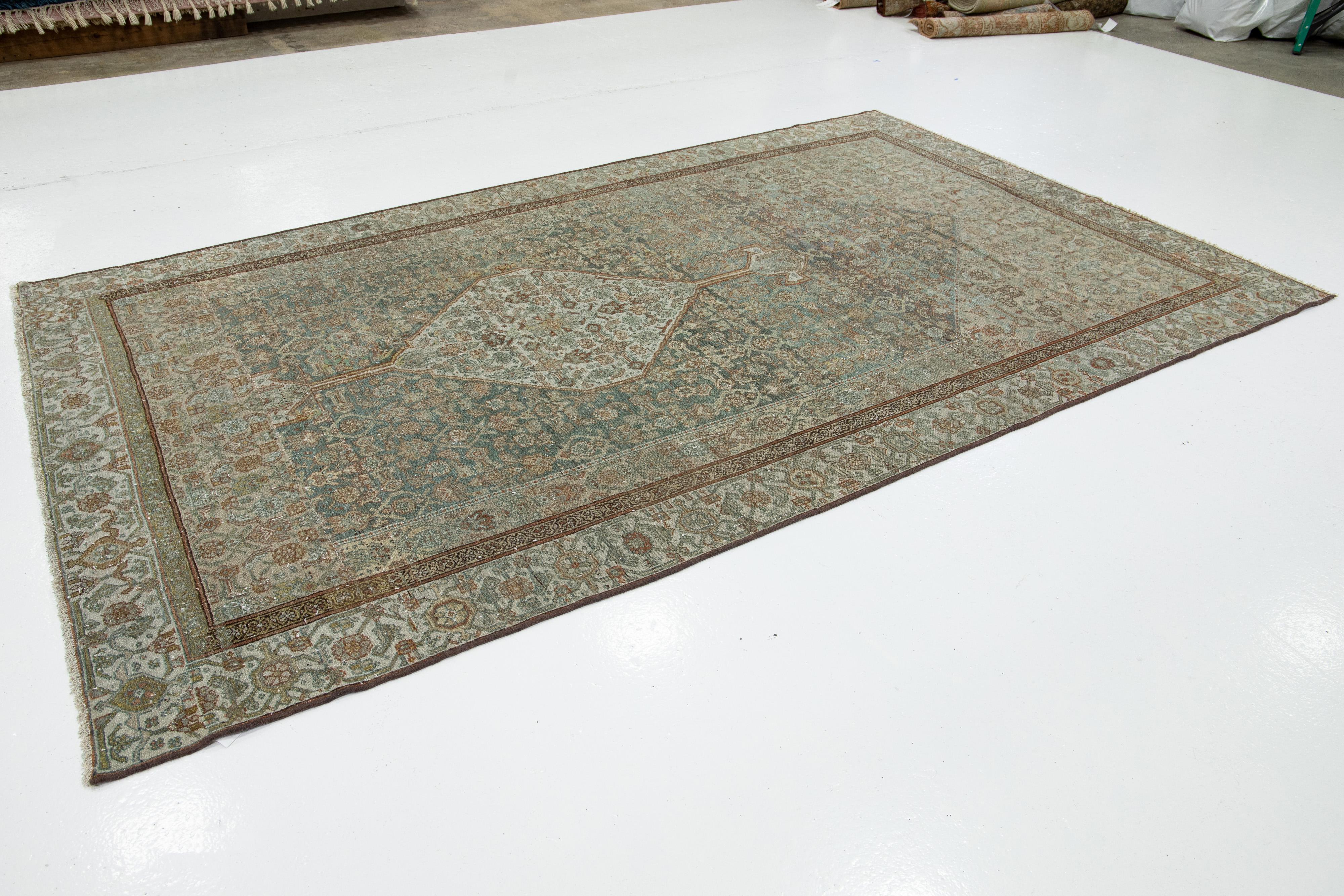 Antique Bibikabad Blue Handmade Persian Wool Rug with Allover Floral Pattern In Good Condition For Sale In Norwalk, CT