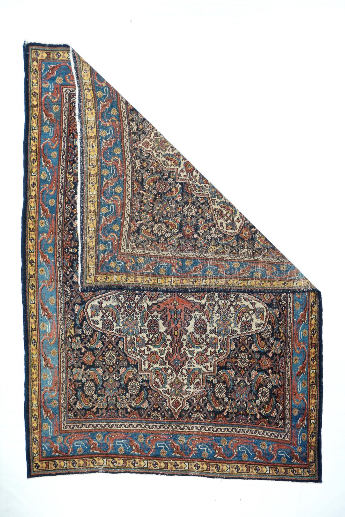Antique Bibikabad rug measures 4'9'' x 6'9''. From the Greater Hamadan Weaving Area, this rather uncommon Bibikabad antique scartter shows a stepped and deeply lobed ivory cartouche subfield centred by a tall, multiply pendanted pole medallion, all