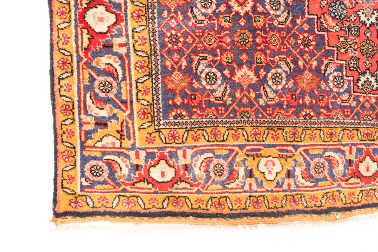 An especially detailed Bidjar, colourful and intricate. The dynamism of the outer border -and the field – exhibit the high degree of art and craft typical of Bidjar carpets – which are known as the iron carpets of Asia. This is due to the hammering