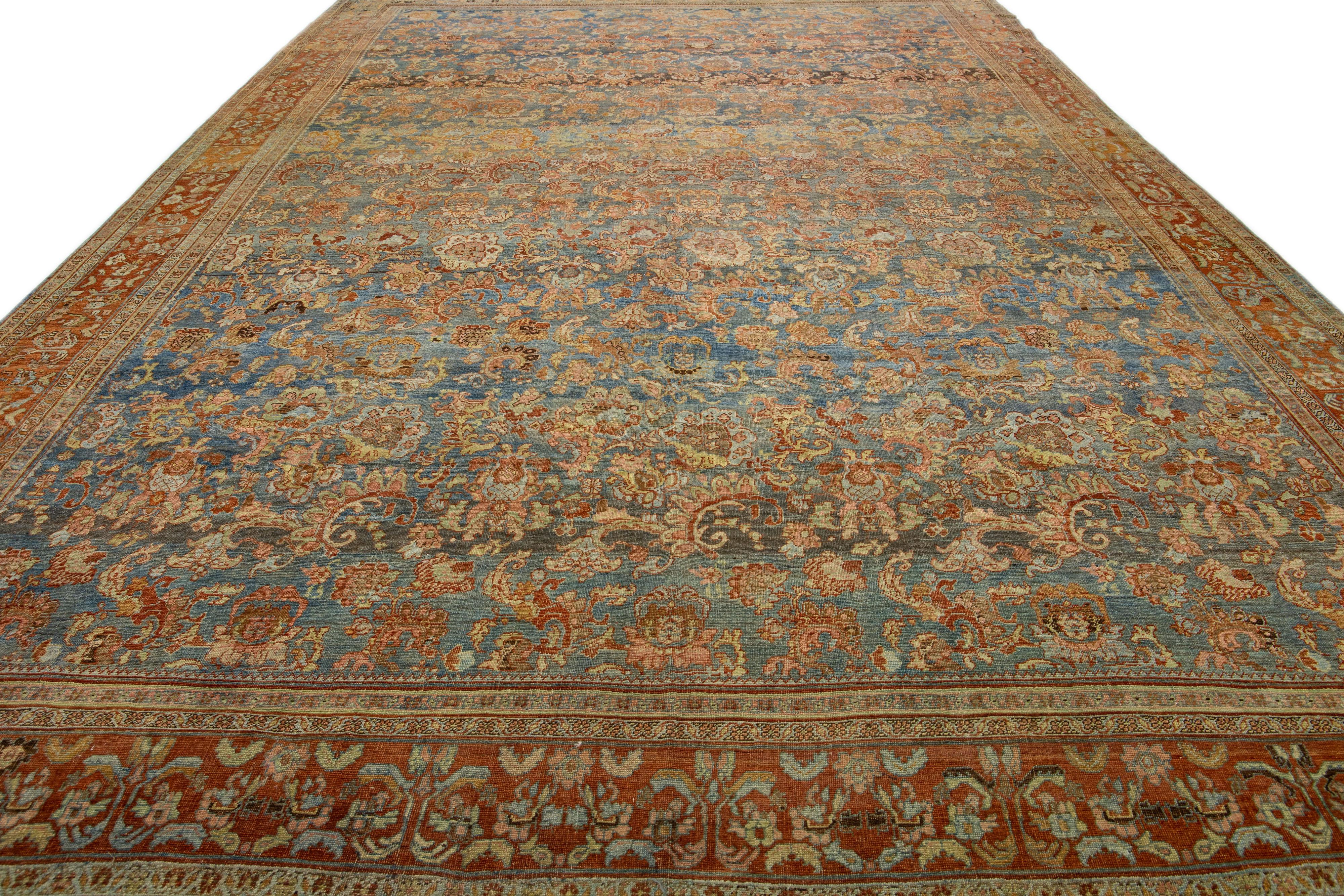 Islamic Antique Bidjar Handmade Floral Oversize Rust and Blue Wool Rug For Sale