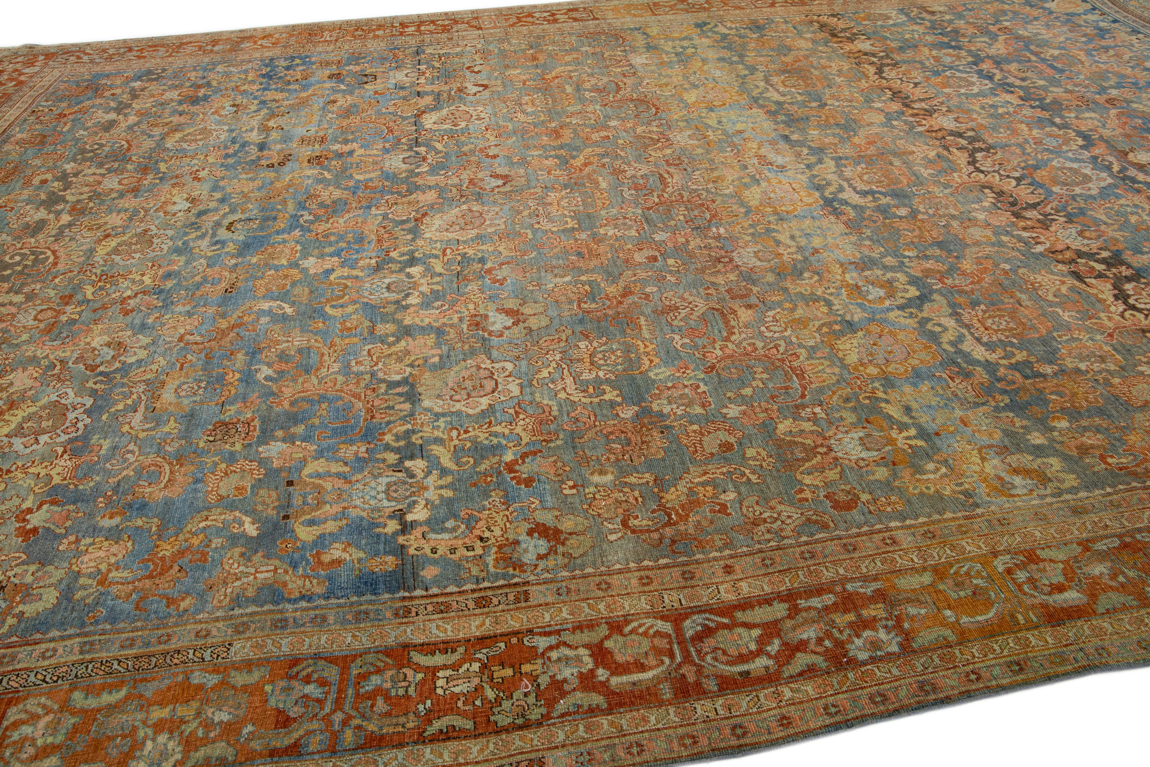 Antique Bidjar Handmade Floral Oversize Rust and Blue Wool Rug In Good Condition For Sale In Norwalk, CT