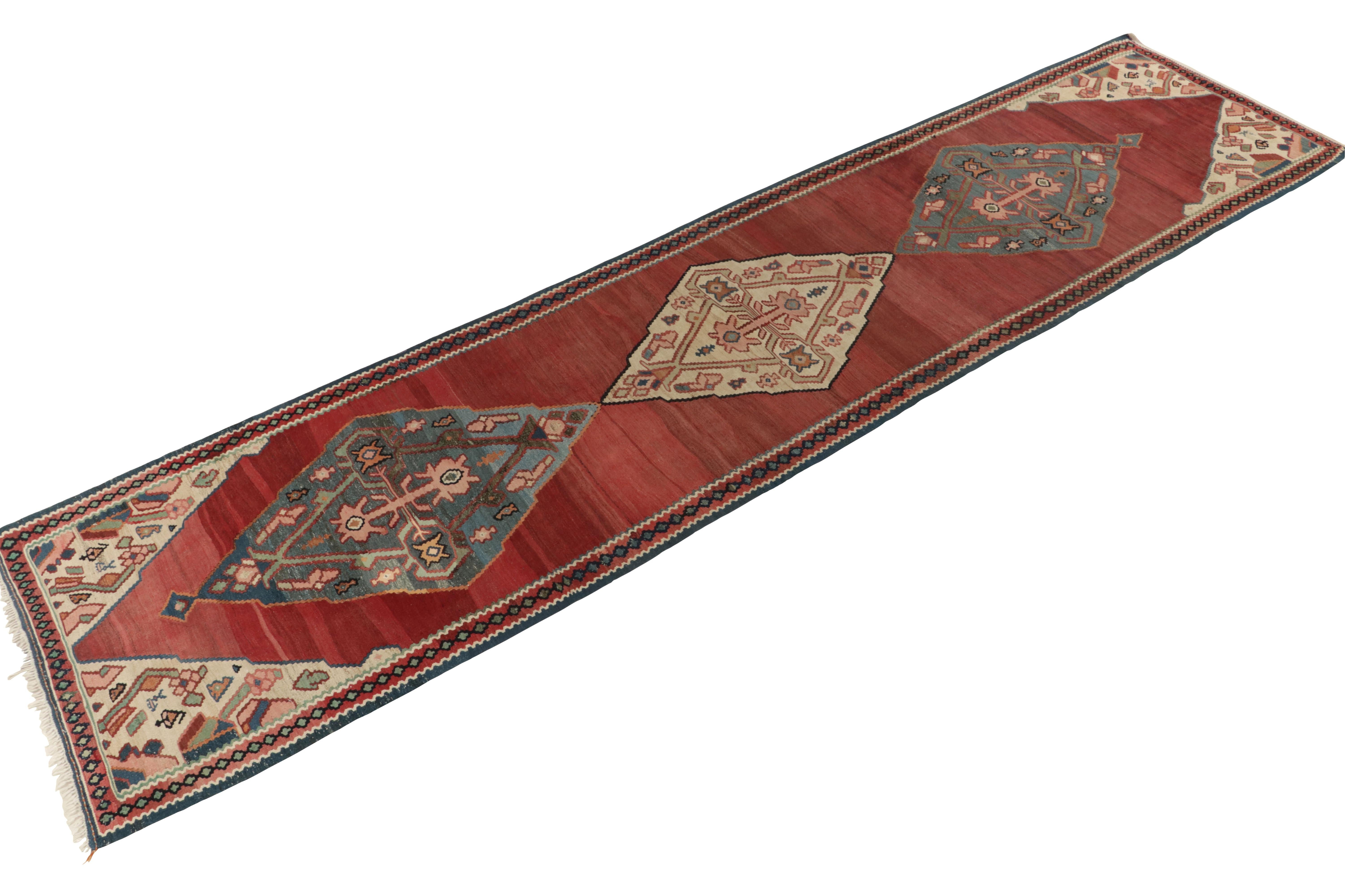 Handwoven in wool, a 4x16 antique Bidjar Kilim newly unveiled from R&K Principal Josh Nazmiyal’s coveted treasury of Persian masterpieces. 

Originating circa 1920-1930, this particular tribal flat weave showcases a brilliant medallion style on a