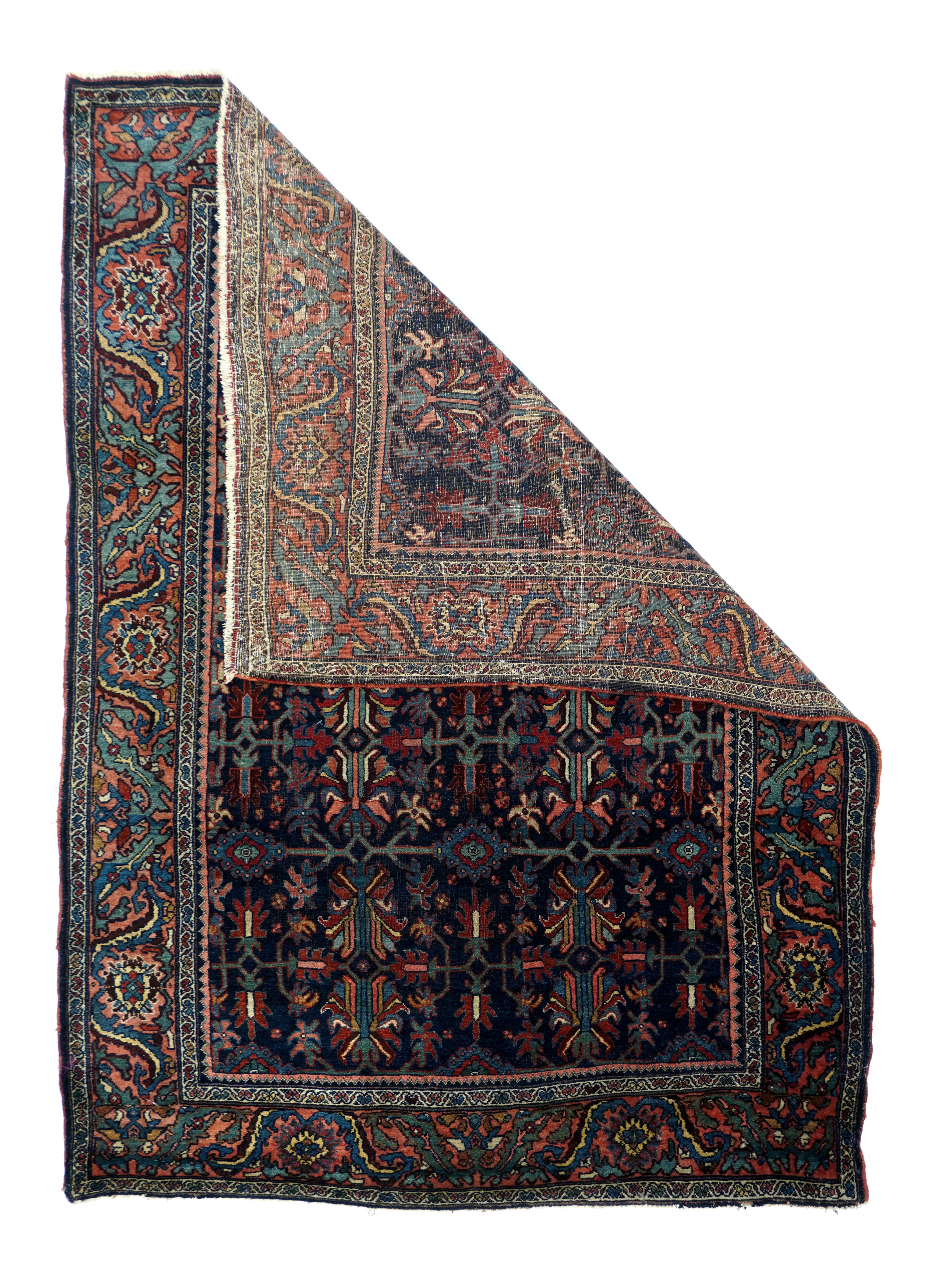 Antique Bidjar rug. Meaures: 4.4'' x 6.4''. The rich indigo navy field shows an end-to-end, two column layout of paired, facing thin petal palmettes in a suggested square lattice with blue lappet-fringed lozenges at the crossings. Rose main border