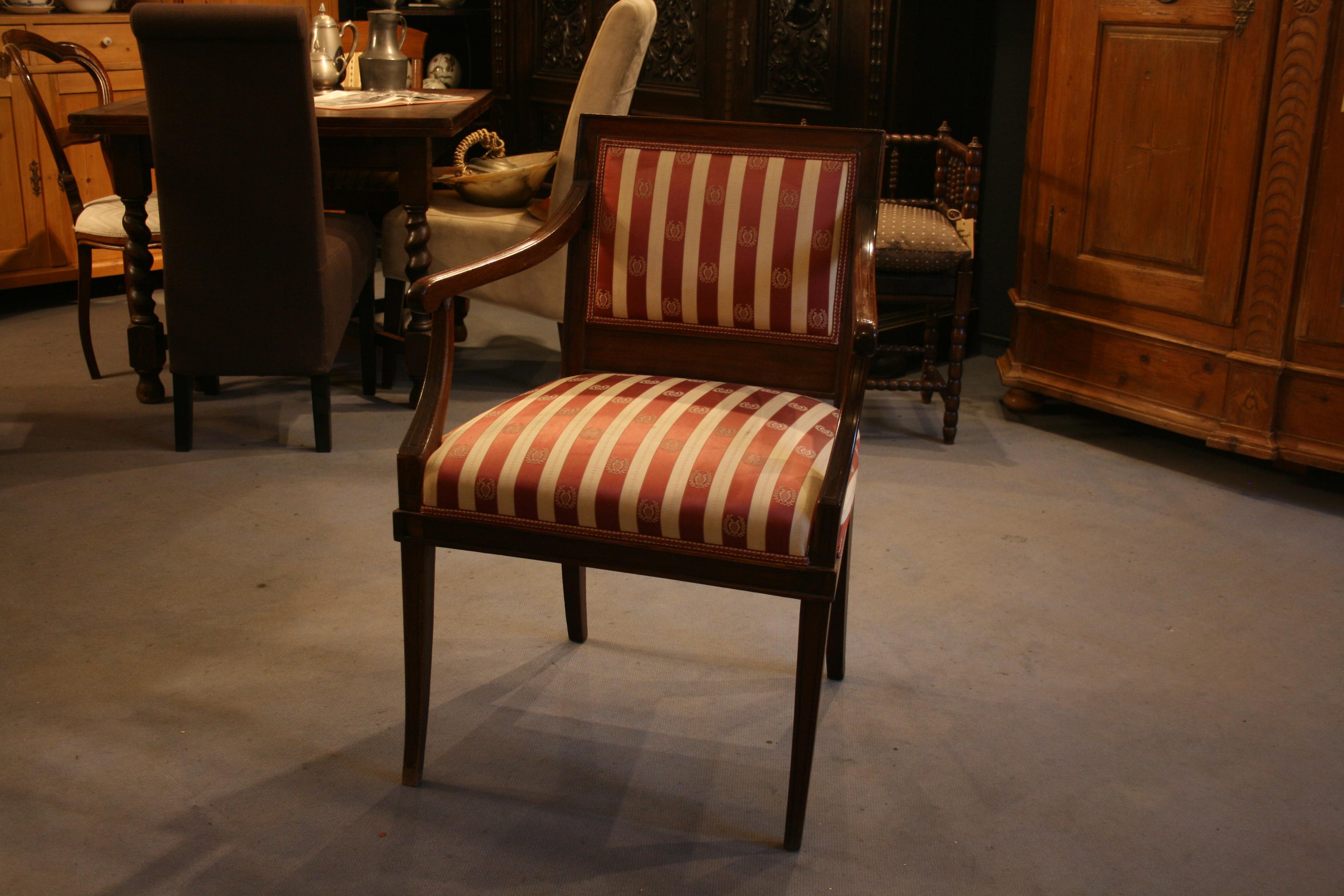 Antique Biedermeier armchair from circa 1840. 

Dimensions: 87 cm high, 50 cm wide, 50 cm deep; seat height: 49 cm.