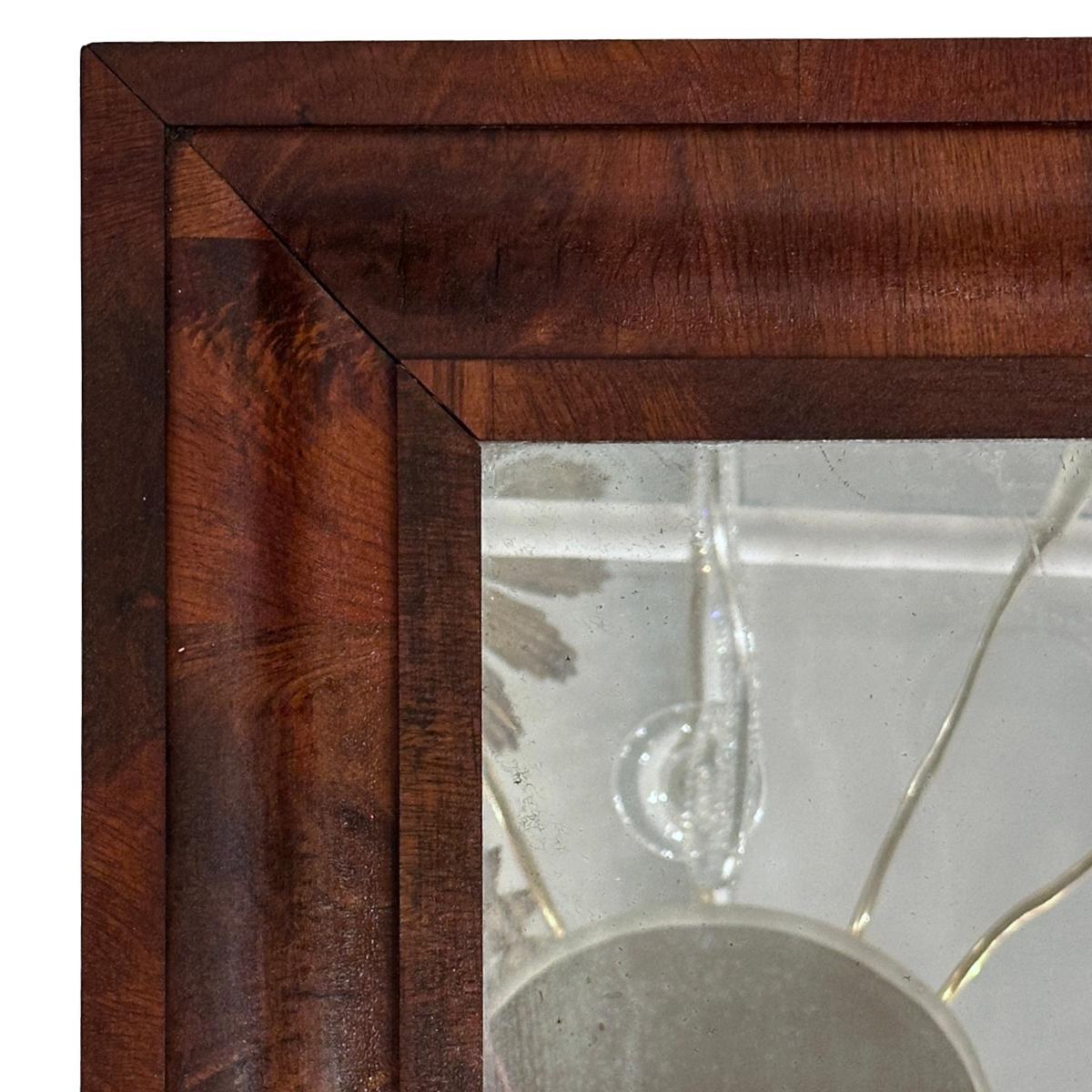 A circa 1920's Northern Italian Biedermeier mirror.

Measurements:
Height: 28.25