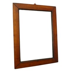 Used Biedermeier mirror with wooden frame. 1820 - 1850