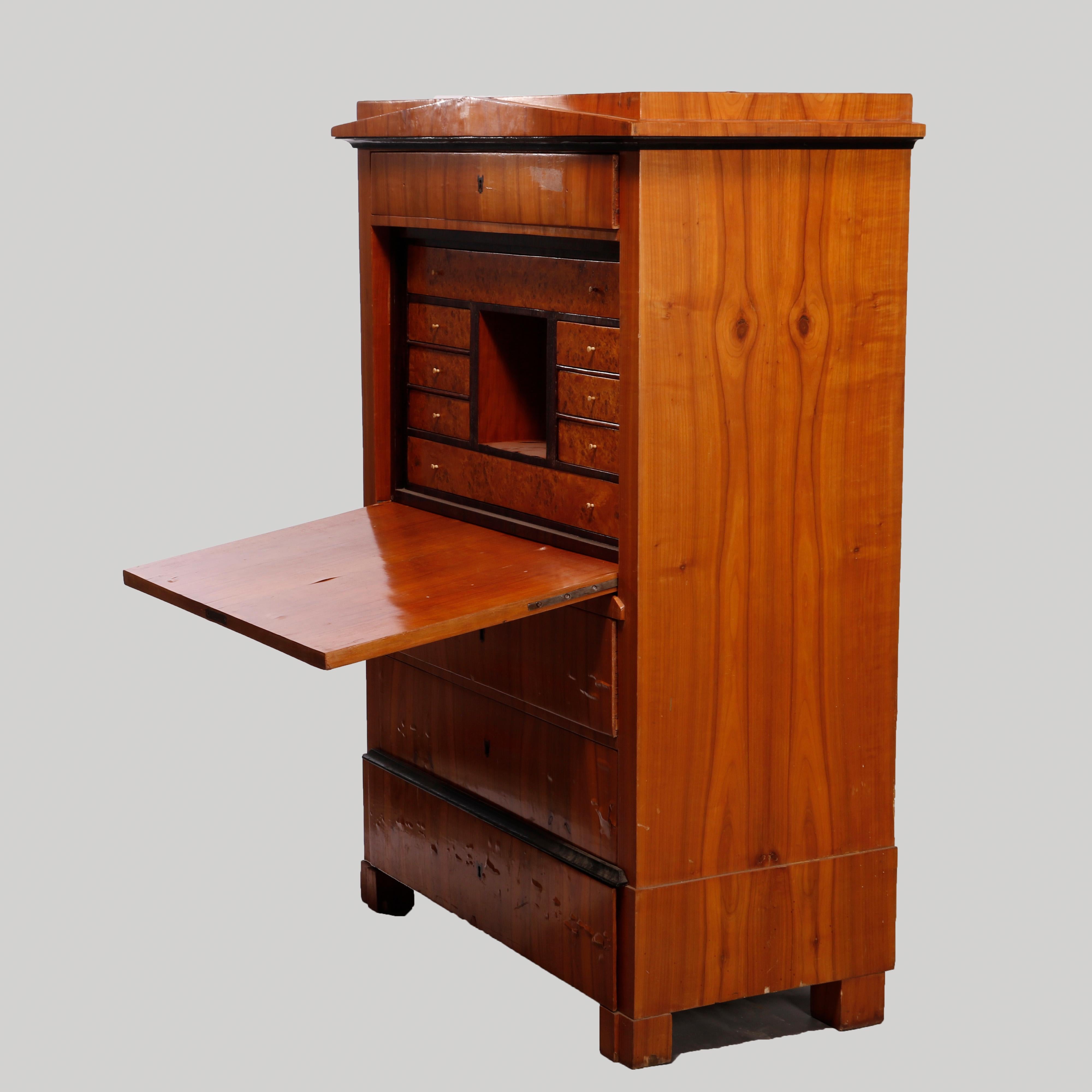 An antique Biedermeier abattant secretary offers olive wood and burl construction with upper frieze drawer over drop front secretary and three long drawers, raised on block feet, ebonized highlight trim throughout, c1830

Measures- 59.75''H x 42''W