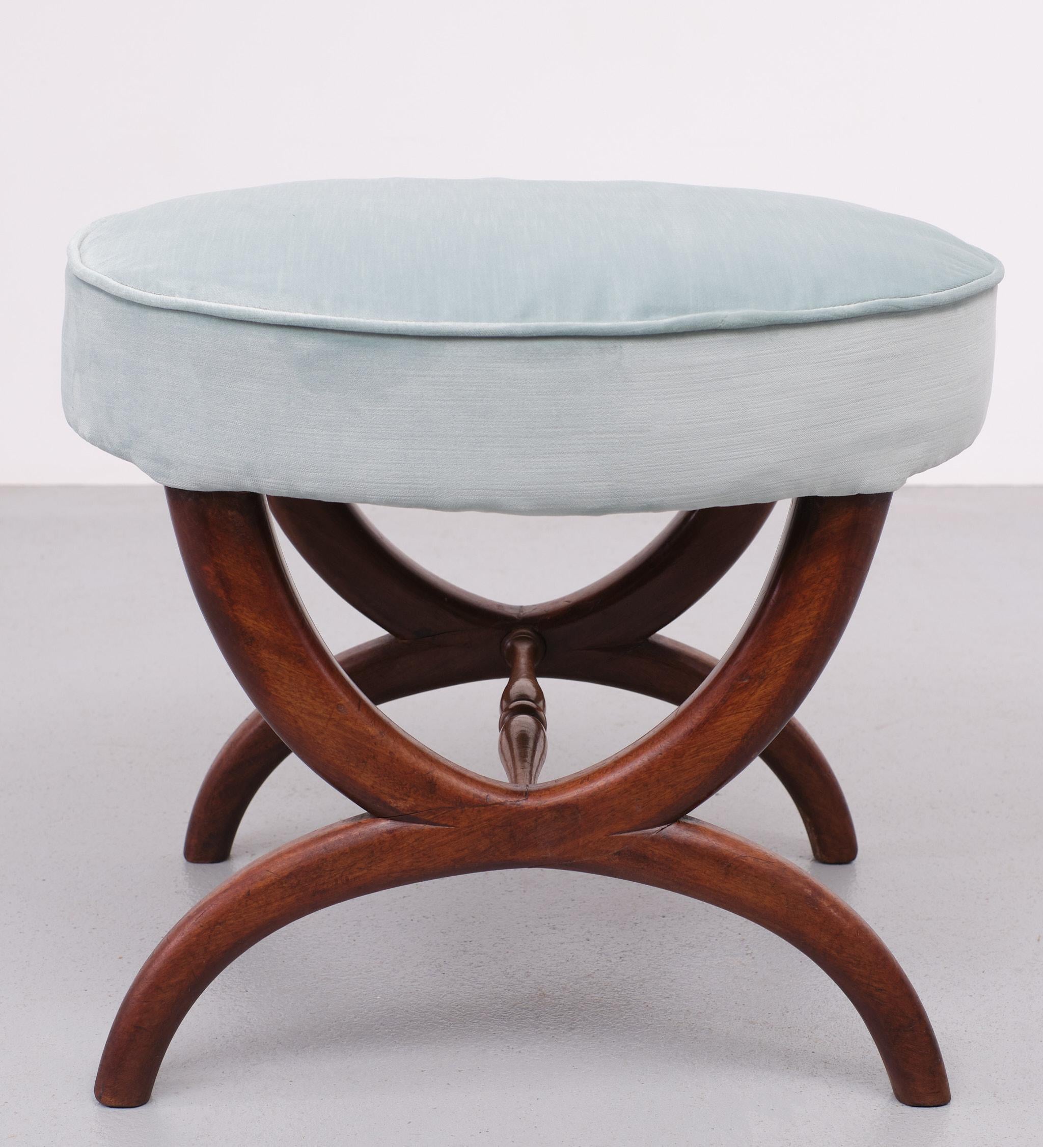 Lovely stool or ottoman. Typical Biedermeier style mahogany base. Oval shaped top.
Brand new baby blue velvet upholstery.