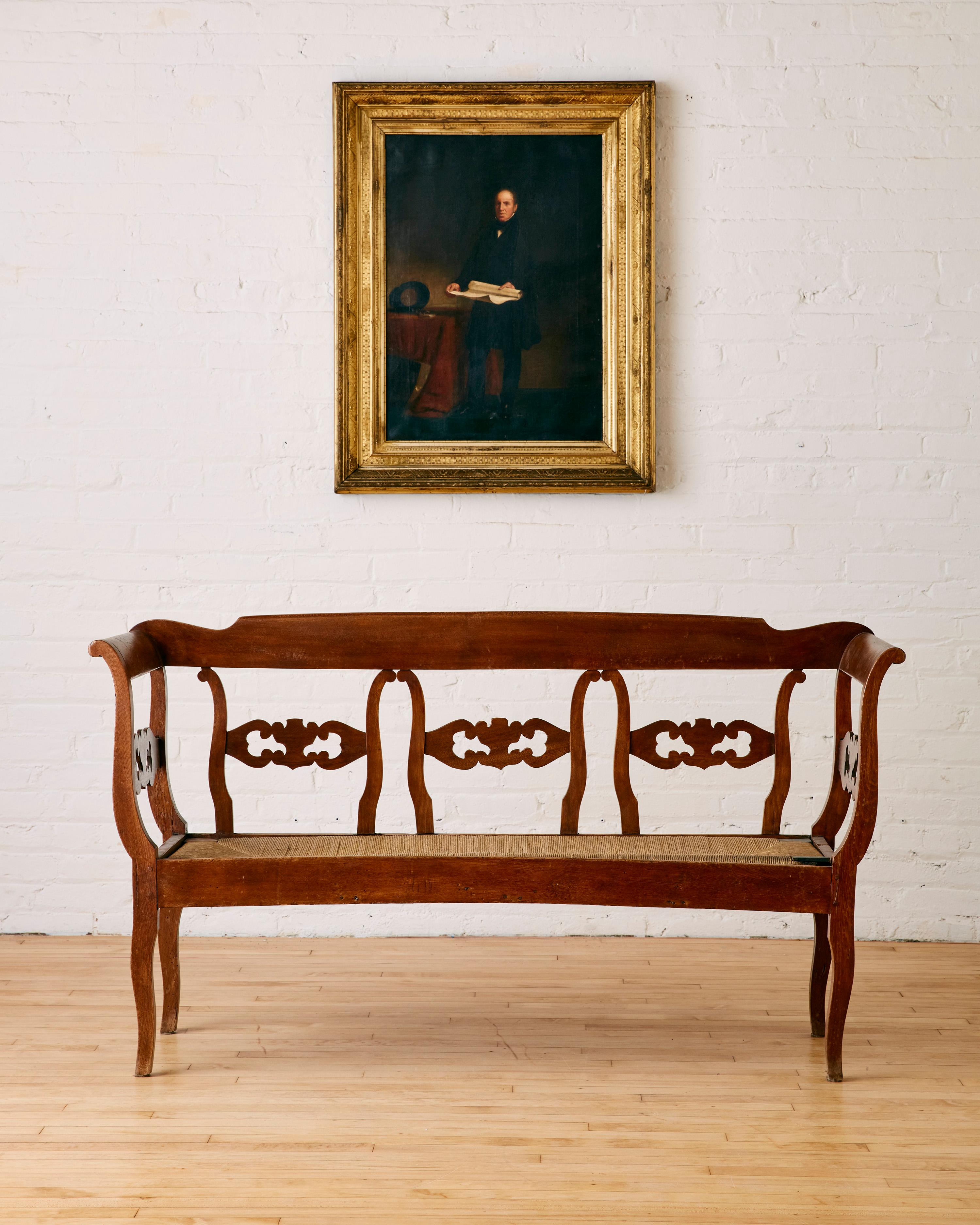 Antique Biedermeier Settee with Rush Seating and Carved Backrest.

Dimensions: 31.75