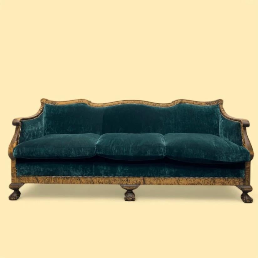 A stunning circa 1800s Biedermeier three seater sofa from the transitional period between Neoclassicism & Romanticism.  The sofa epitomizes the grace & sophistication of its era. The sofa frame is a masterpiece of expert woodworking being 