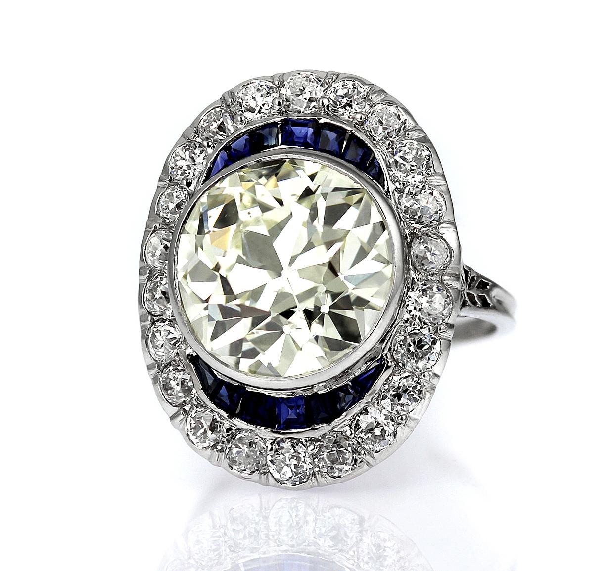 Retro Antique Big Diamond 6.6 ct with Sapphire Ring in Platinum