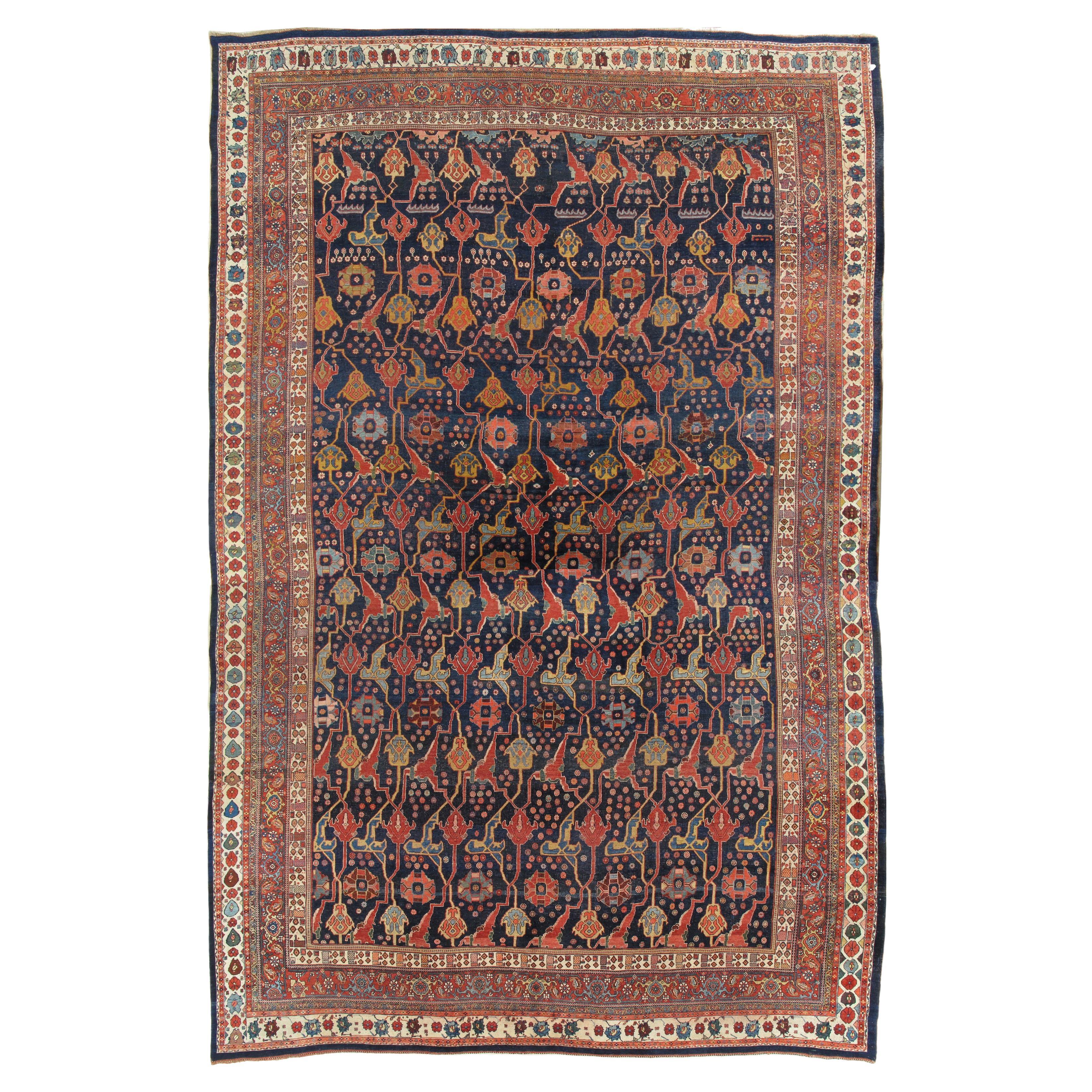 Tapis oriental ancien Bijar, fait à la main, bleu marine, rouge, bleu clair et vert