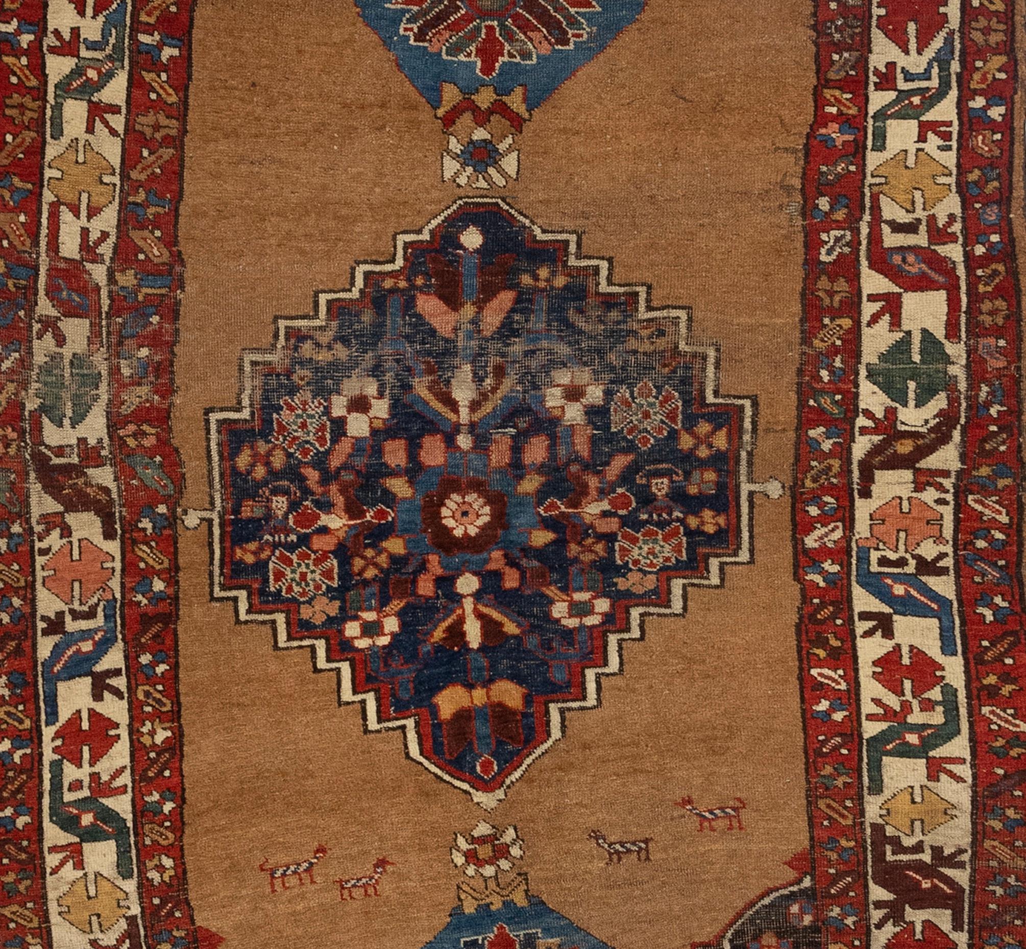This antique Bijar rug is an extraordinary piece of woven art that showcases the renowned craftsmanship and distinctive style of Bijar rugs, originating from the Bijar region in Iran. Known for their durability and exceptional quality, Bijar rugs