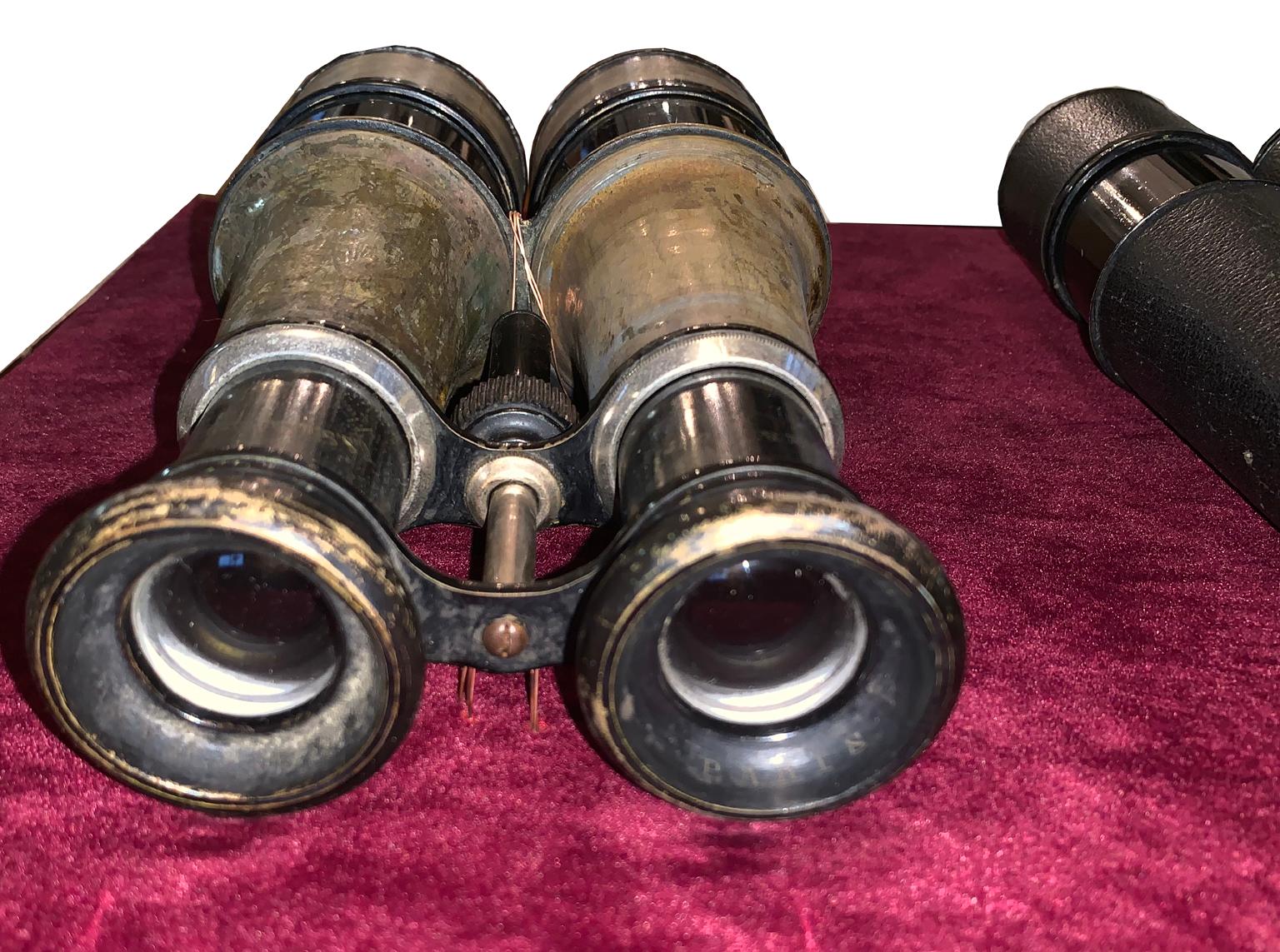 Set of three Civil war binoculars in a beautiful mahogany shadow box. Each elegantly mounted on a felt back drop this piece makes a special office or den wall mount. The box can set upright or be mounted on a wall.
