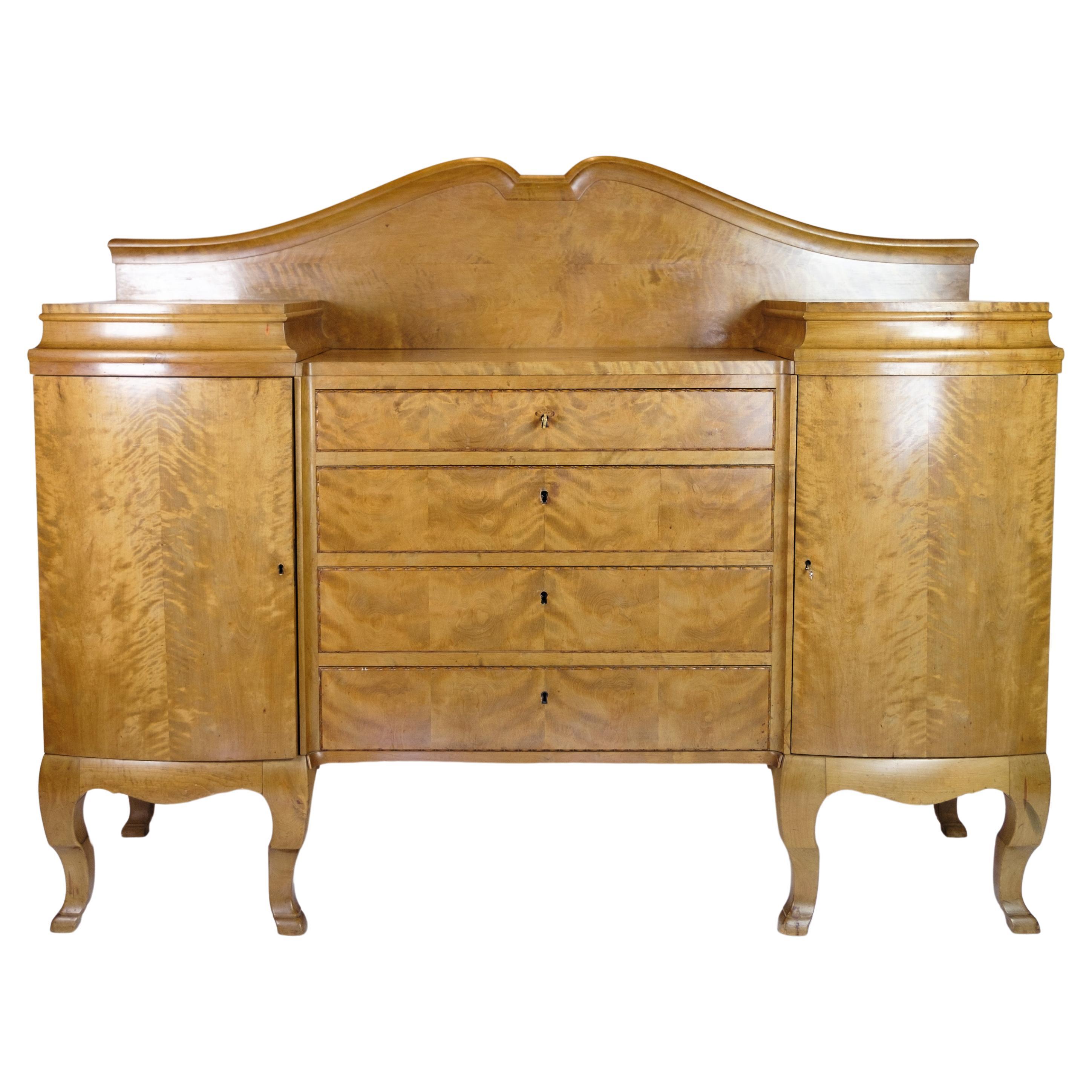 Antique birch sideboard with 4 drawers with original key from around the 1920s For Sale