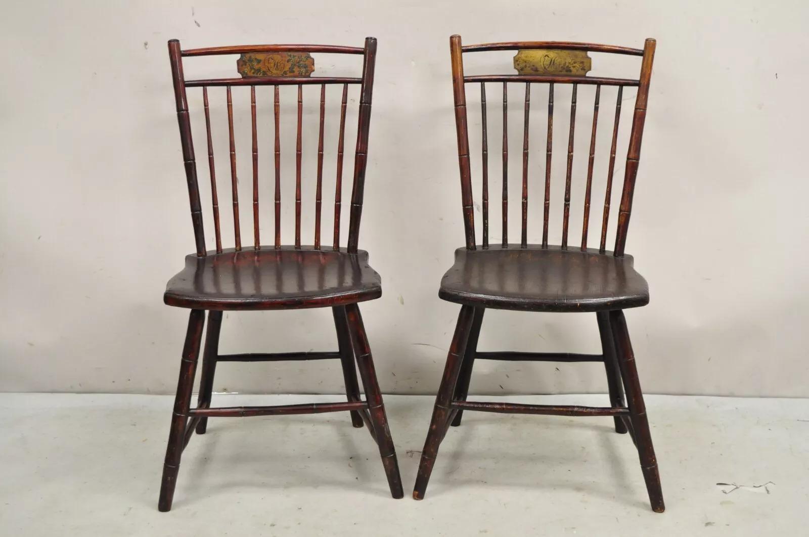 Antique Birdcage Ash Windsor Hand Painted Lippincott Family Side Chairs - a Pair. Chairs feature hand painted monogram to top rails as well as original paperwork to the underside. Circa Mid 19th Century. Measurements: 35