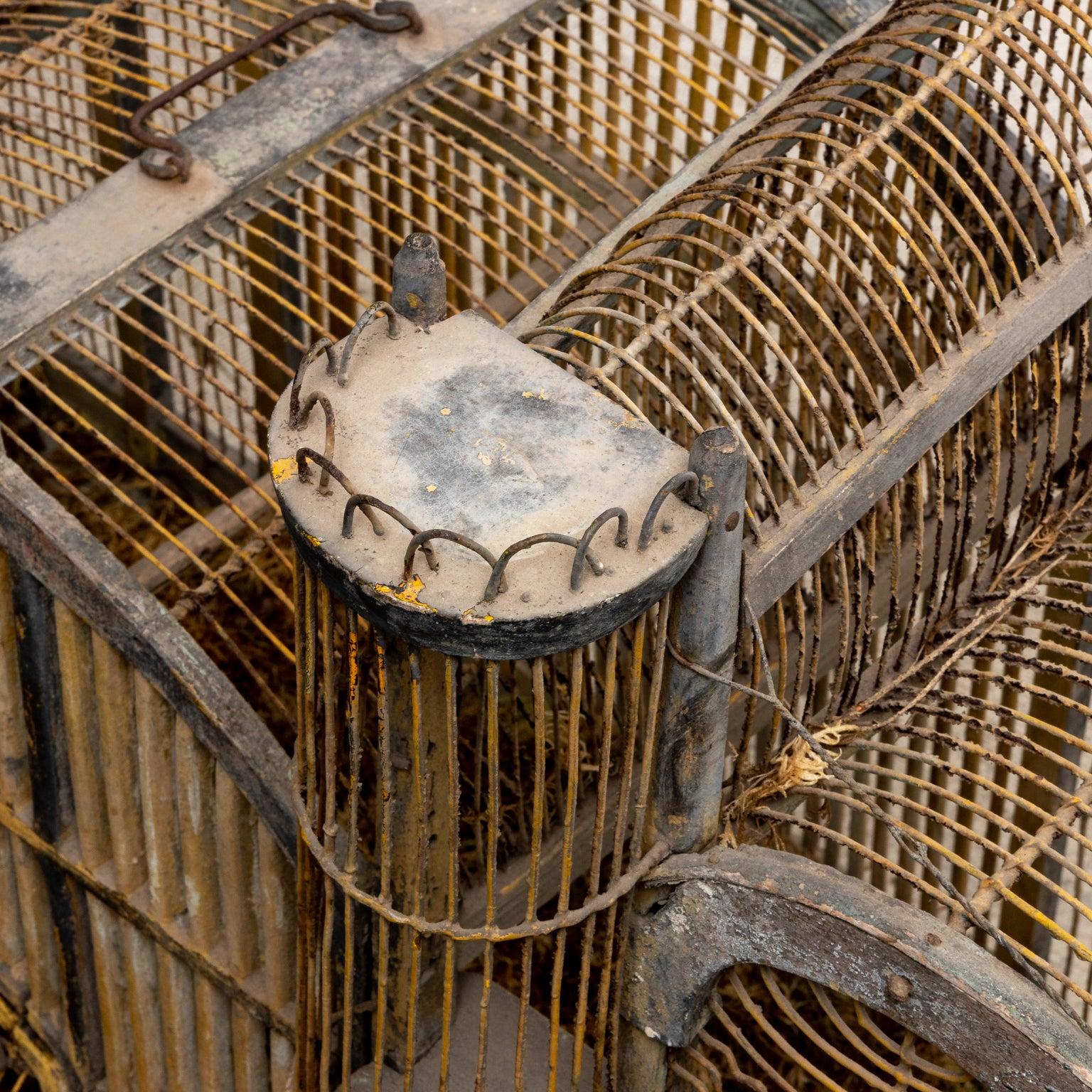 Large scale architectural form French birdcage with wood and wire construction. Made in France in the early 20th century. Please note wear consistent with age.
 