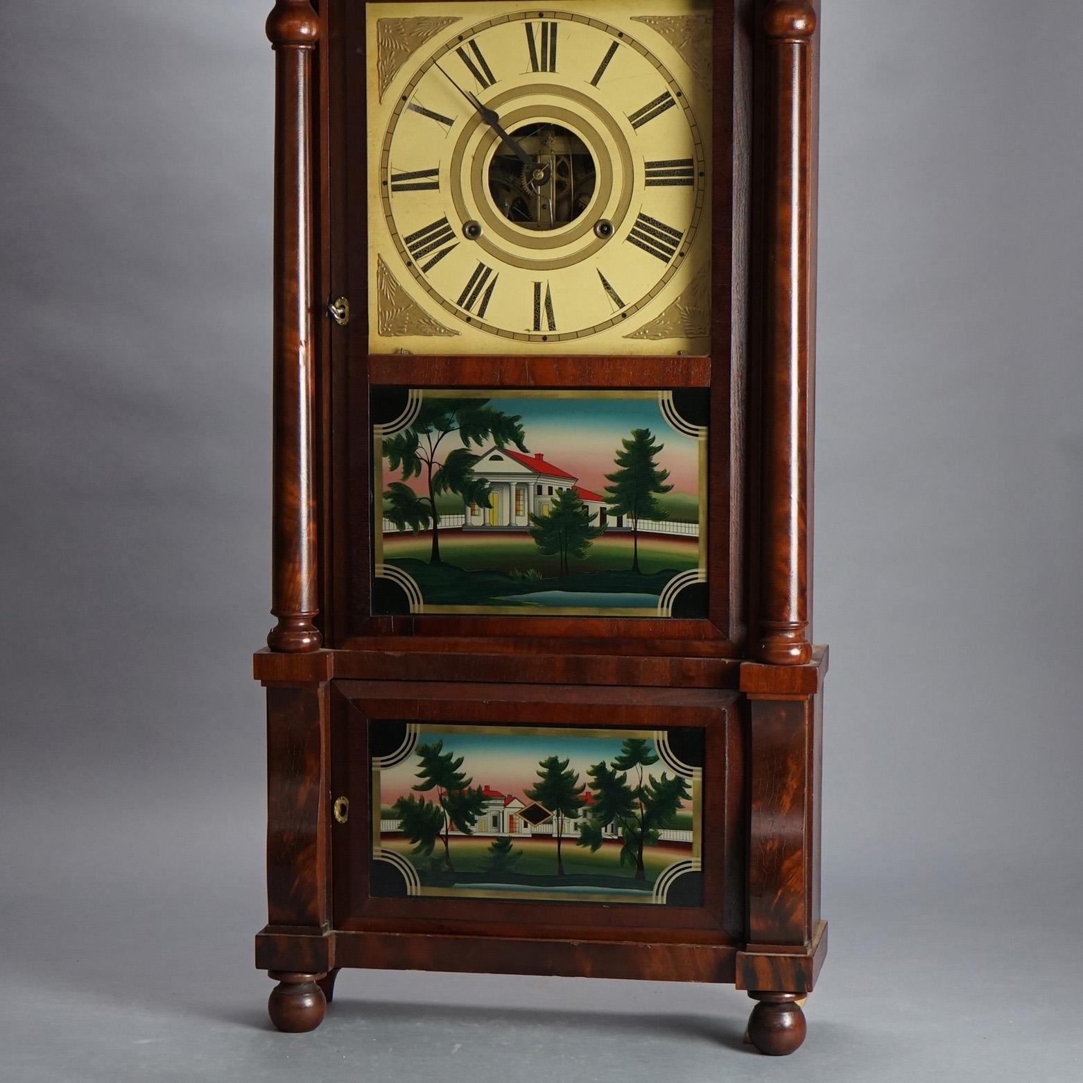 Antique Birge and Mallory American Empire Flame Mahogany Open Escapement Mantle Clock with Foliate Carved Crest, Flanking Columns and Eglomise Panels having Structures, C1840

Measures - 38.75