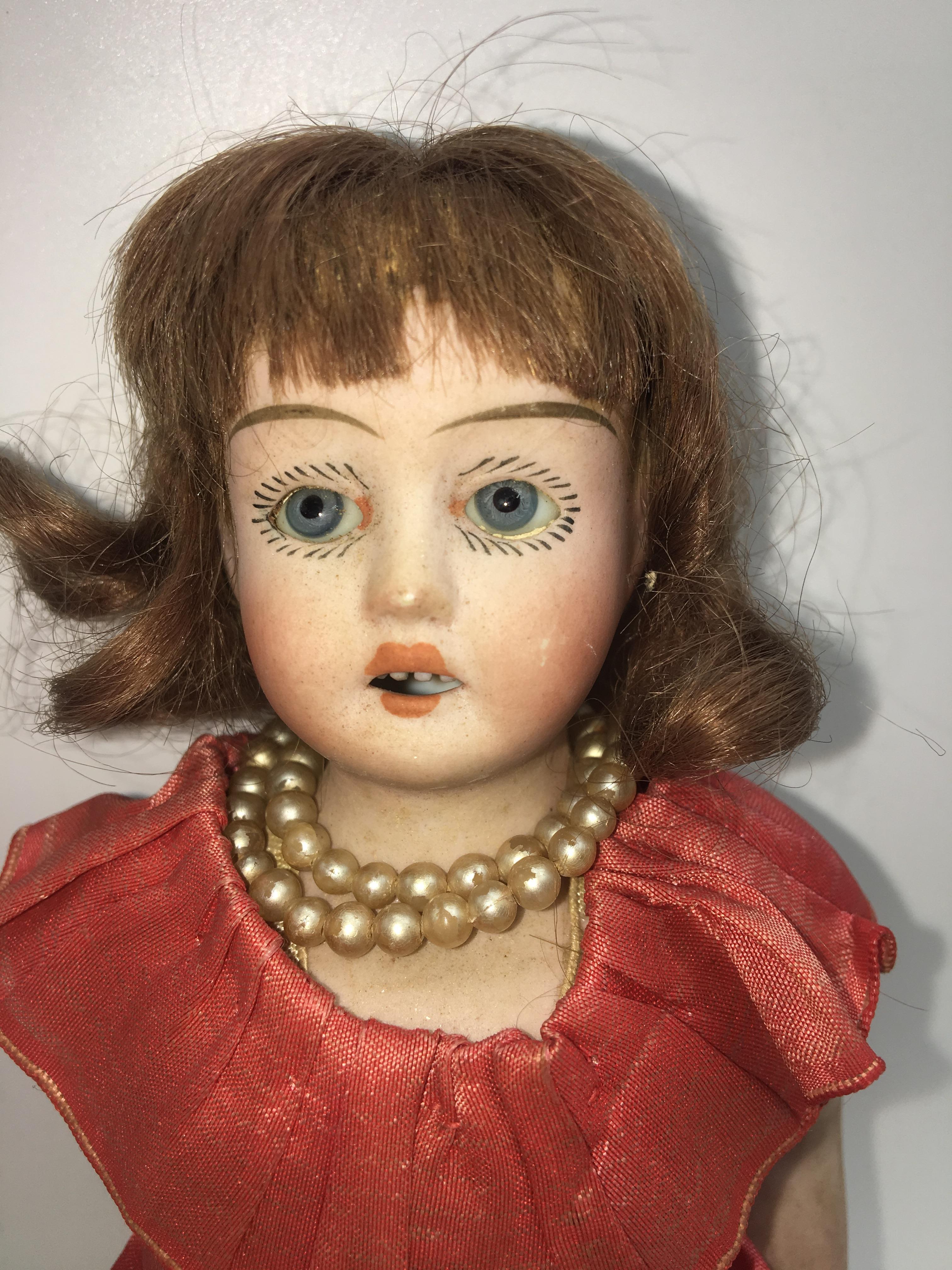 European Antique Bisque Ceramic Doll, circa 1920 For Sale
