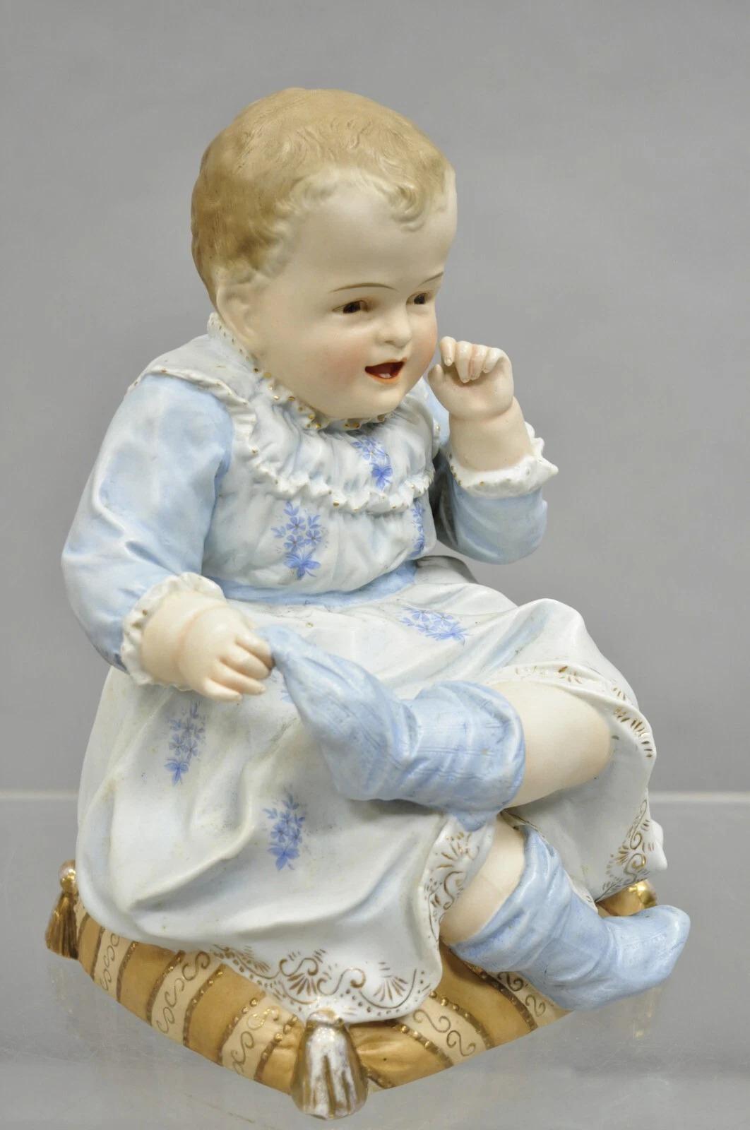 20th Century Antique Bisque Porcelain Seated Baby Figurine in Circular Glass Display Cloche For Sale