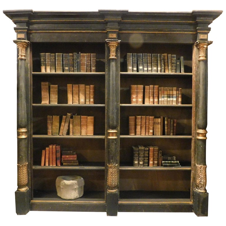 Black- and gold-lacquered wood bookcase, 1810, offered by Simone Marro