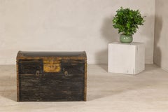 Antique Black and Gold Late Qing Dynasty Trunk with Curved Top and Brass Accents