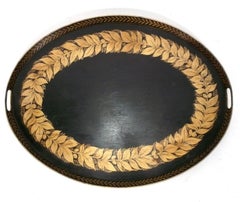 Bandeja para servir o colgar en la pared de tole antiguo negro y dorado