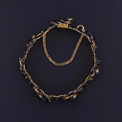 Antique Black Enamel and Diamond Love Knot Bracelet of 14k Gold