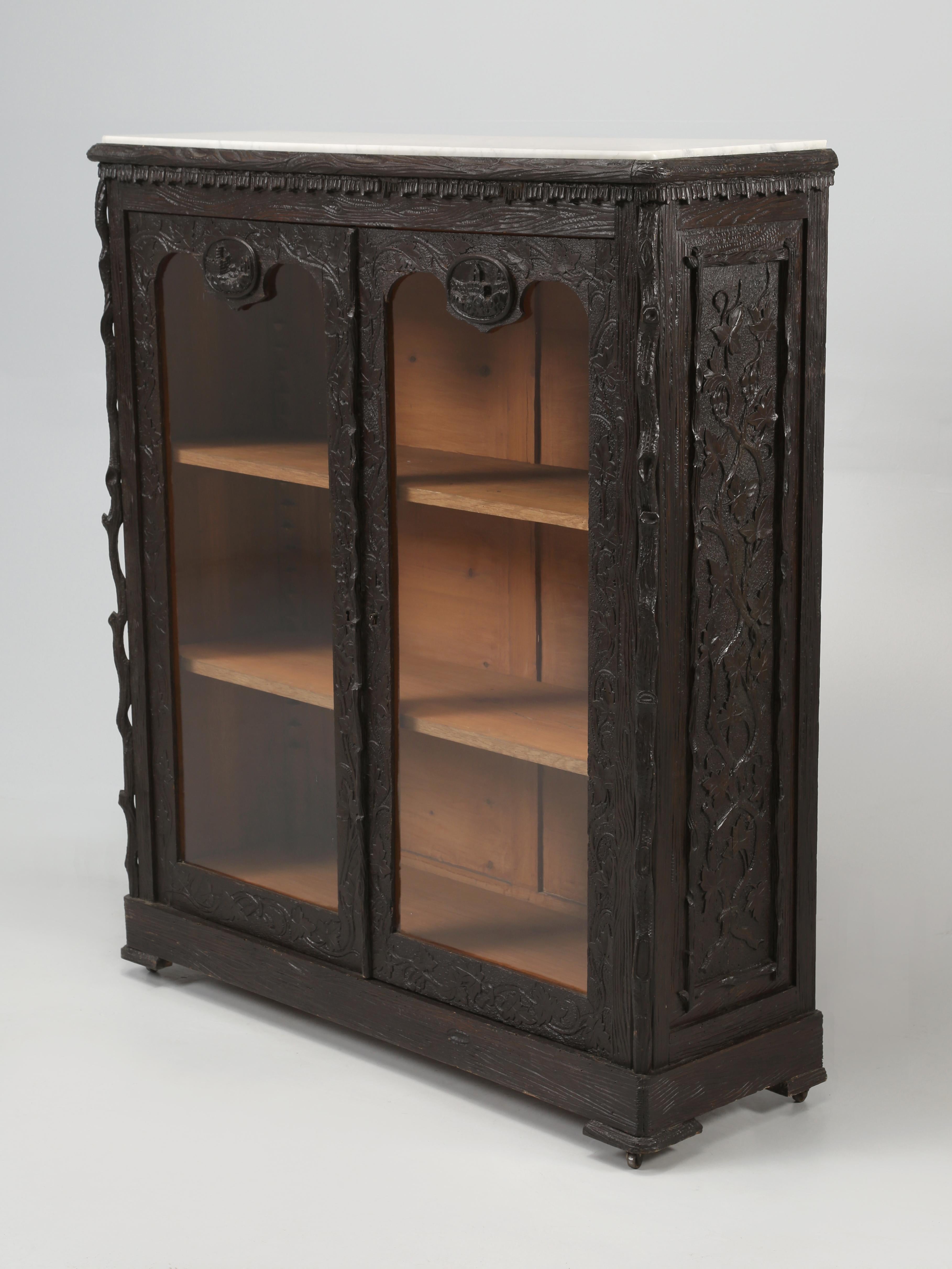 Black Forest bookcase, that was part of a major collection of Black Forest items sold by a Chateau outside of Marseille, France. There is a total of (42) antique Black Forest items that we have imported from the chateau and all will be listed on