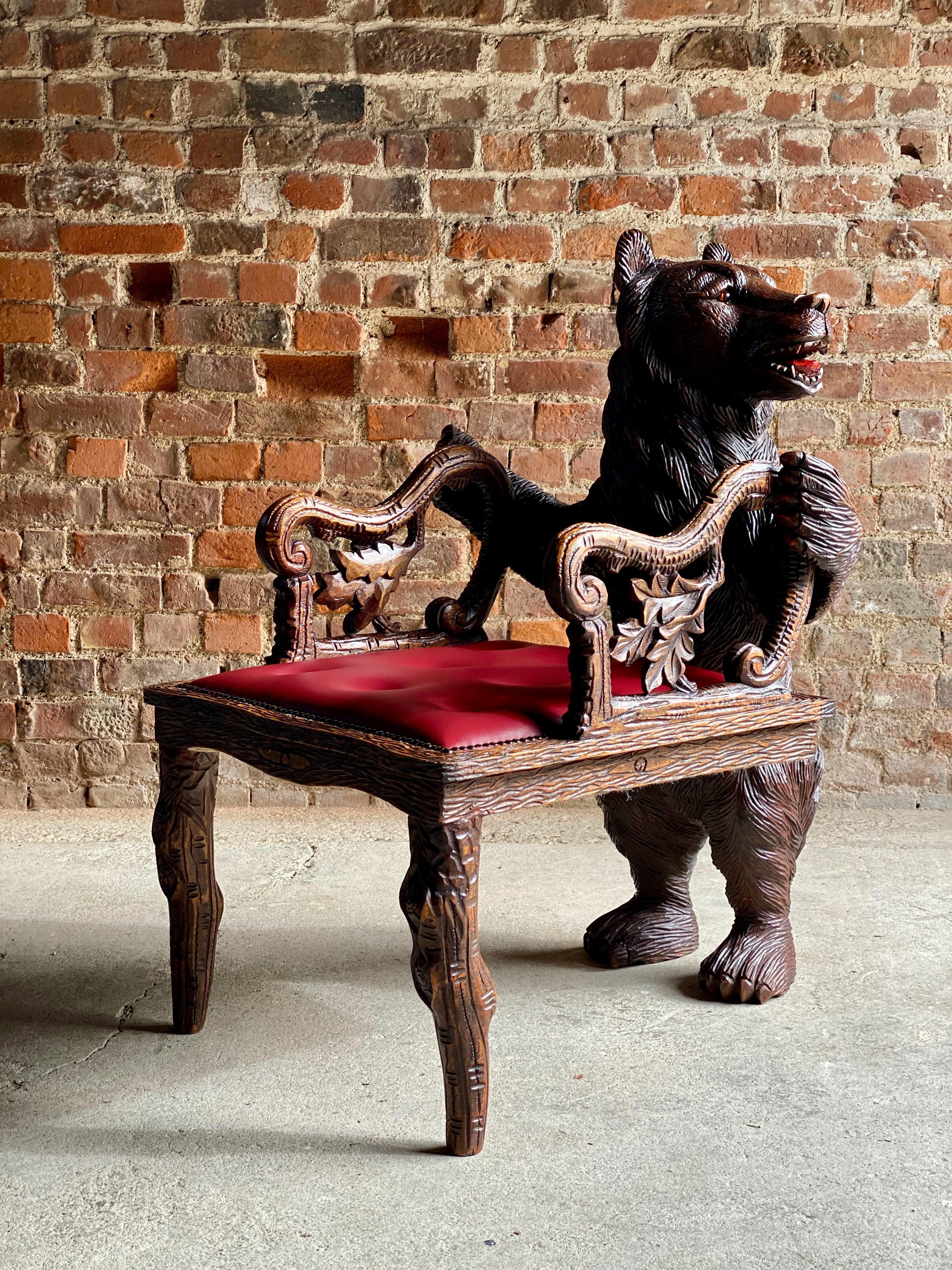 Antique Black Forest carved bear hall chair armchair, 19th century, circa 1875

Magnificent Swiss 19th century Black Forest carved bear hall chair circa 1875, the bear standing on his hind legs looking to his left with his mouth open showing teeth