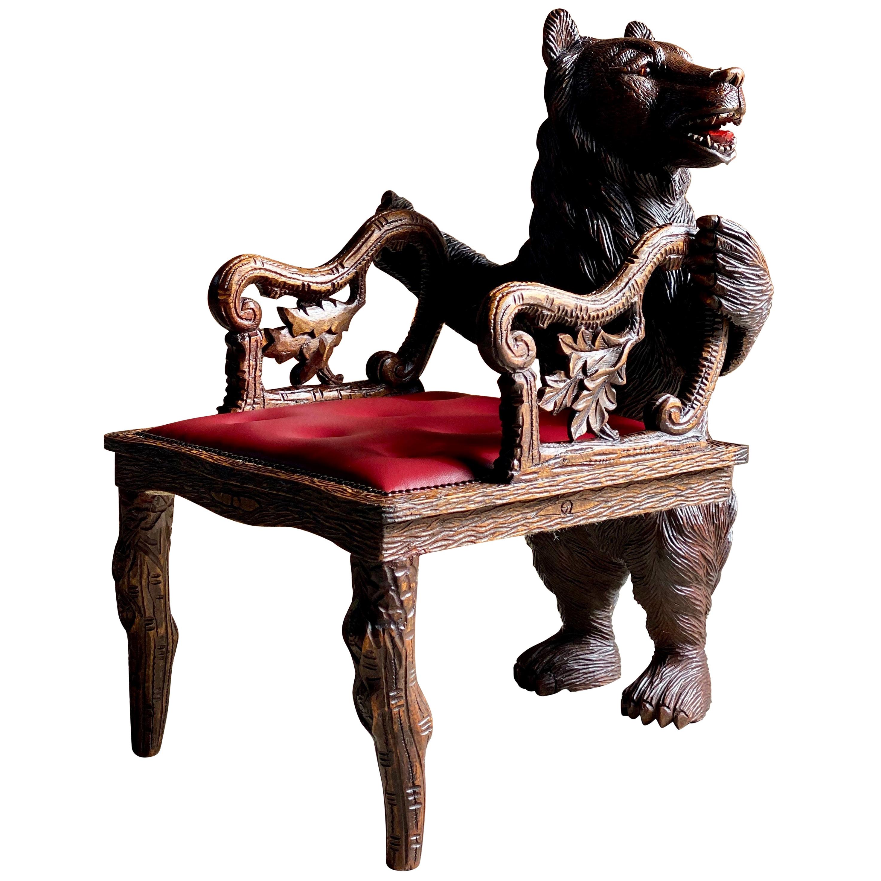 Antique Black Forest carved bear hall chair armchair, 19th century, circa 1875

Magnificent Swiss 19th century Black Forest carved bear hall chair circa 1875, the bear standing on his hind legs looking to his left with his mouth open showing teeth