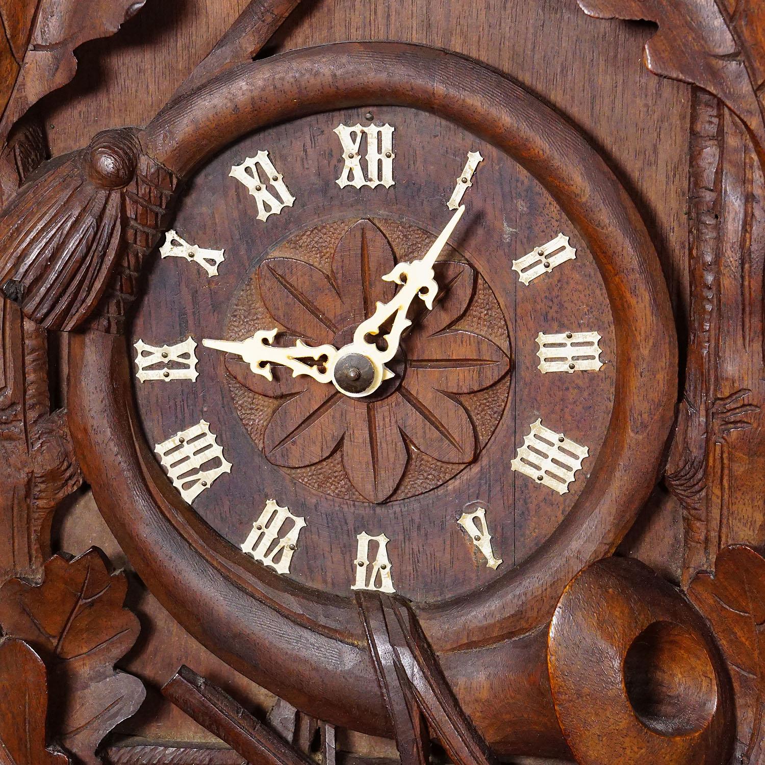 19th Century Antique Black Forest Carved Cuckoo Clock with Stag Head on Top For Sale